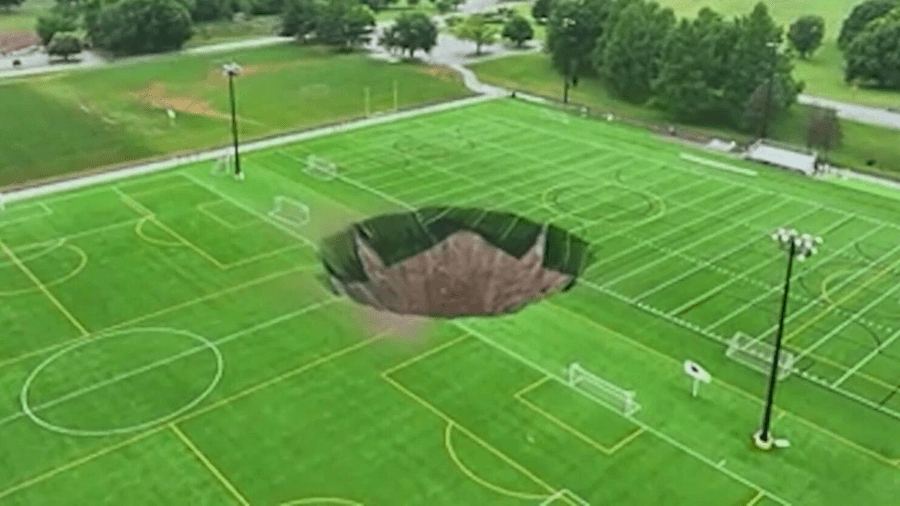 Massive sinkhole opens up at a soccer field in Illinois