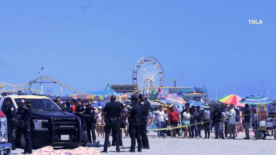 One person was stabbed and another injured after a large brawl broke out ont he beach near the Santa Monica Pier on June 29, 2024. (TNLA)