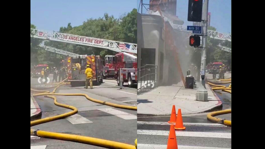 Firefighters worked to extinguish a large blaze that had engulfed Molly Malone's Irish Pub on June 20, 2024. (Citizen)