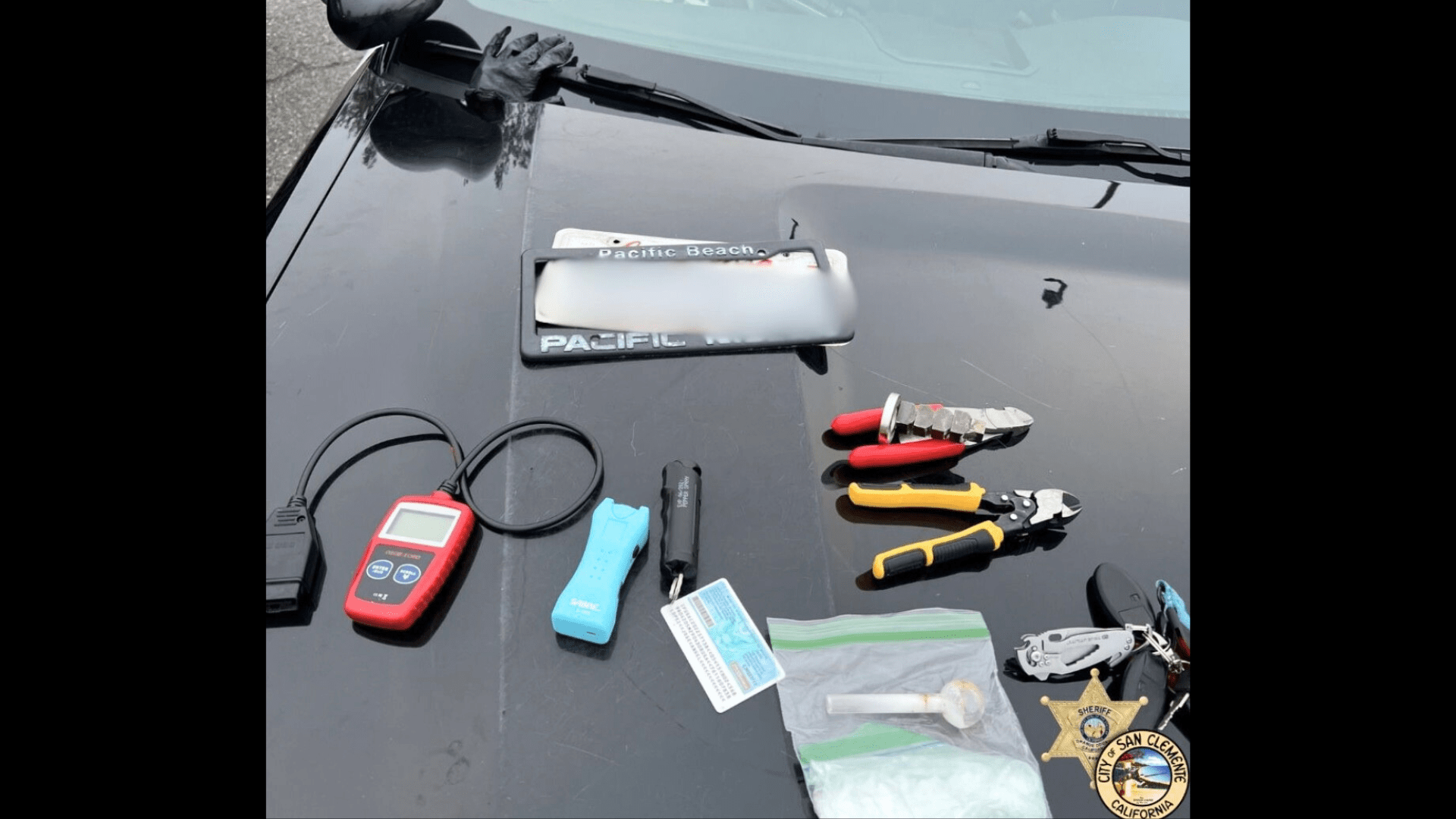 Burglary tools and illegal narcotics were found inside the suspect's stolen vehicle on May 27, 2024. (Orange County Sheriff's Department)