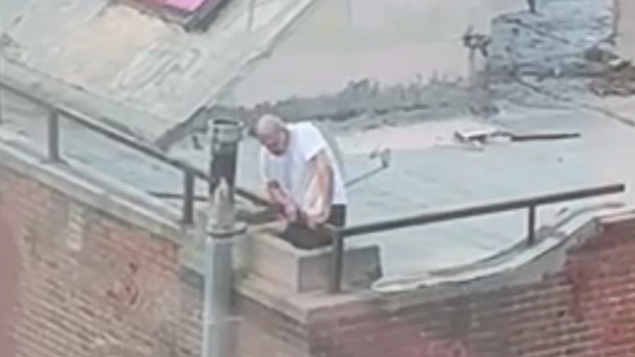 Man climbs into chimney