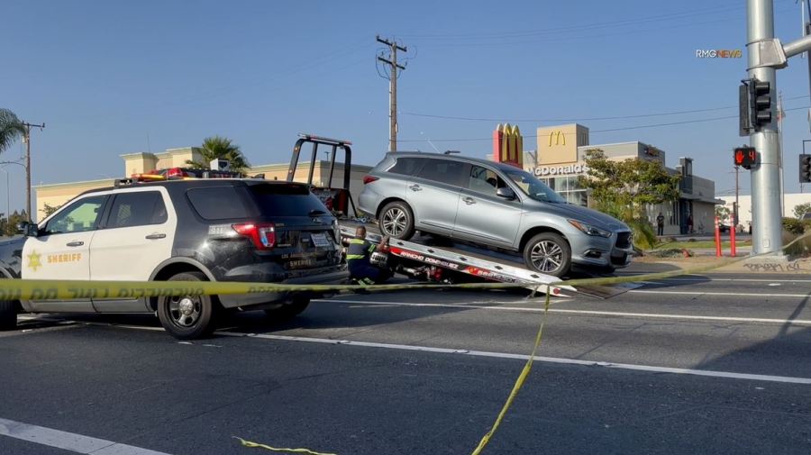 A large SUV was cordoned off and later towed after a man was found stabbed to death at a busy Lennox intersection on June 18, 2024. (RMG)