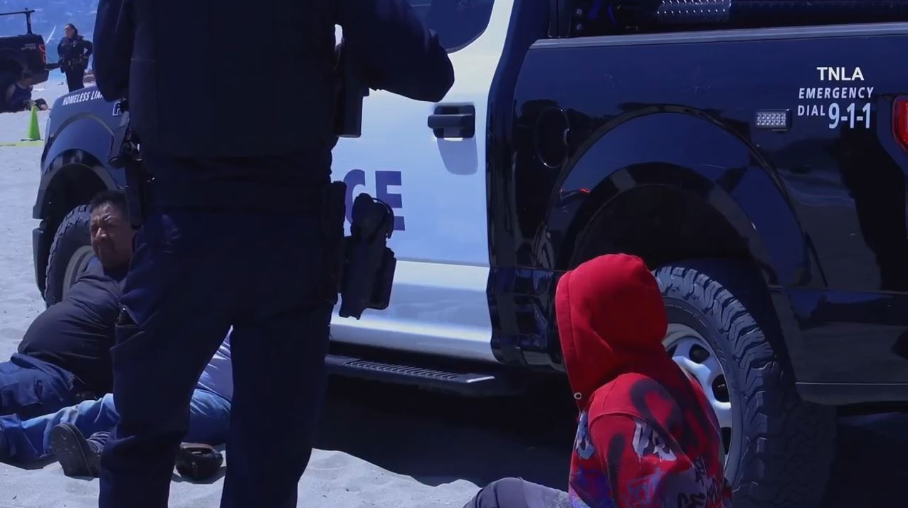 Five people were arrested after a large brawl left one person stabbed and another injured on the beach near the Santa Monica Pier on June 29, 2024. (TNLA)