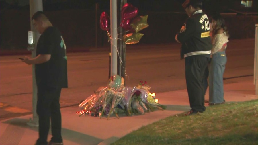 Friends, classmates and loved ones gathered at a makeshift memorial near the crash site to Honor Zach Henn in Placentia on June 4, 2024. (KTLA)