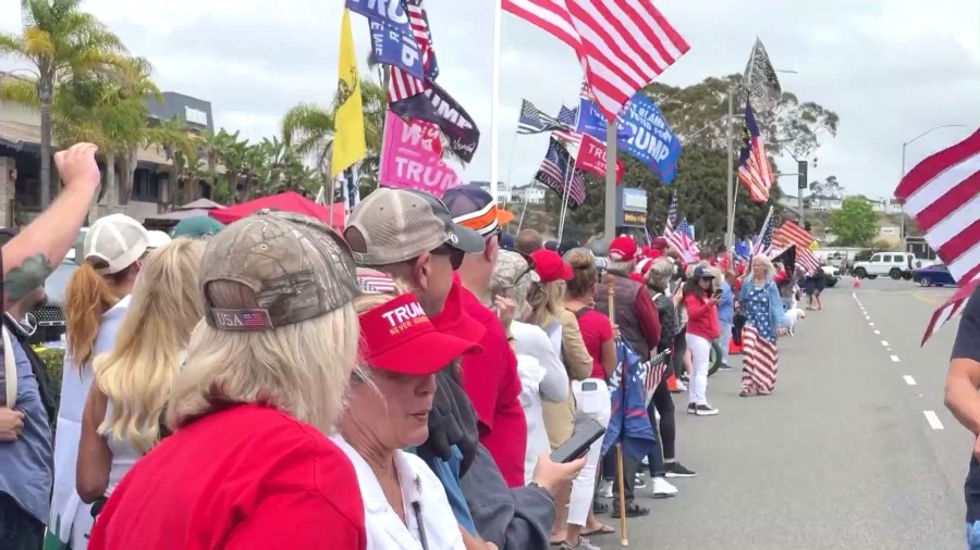 Supporters lined the streets of Newport Beach to await the arrival of Donald Trump's motorcade on June 8, 2024. (KTLA)