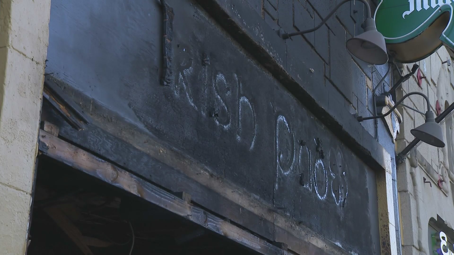 The charred exterior of Molly Malone's Irish Pub is seen after a large fire on June 20, 2024. (KTLA)