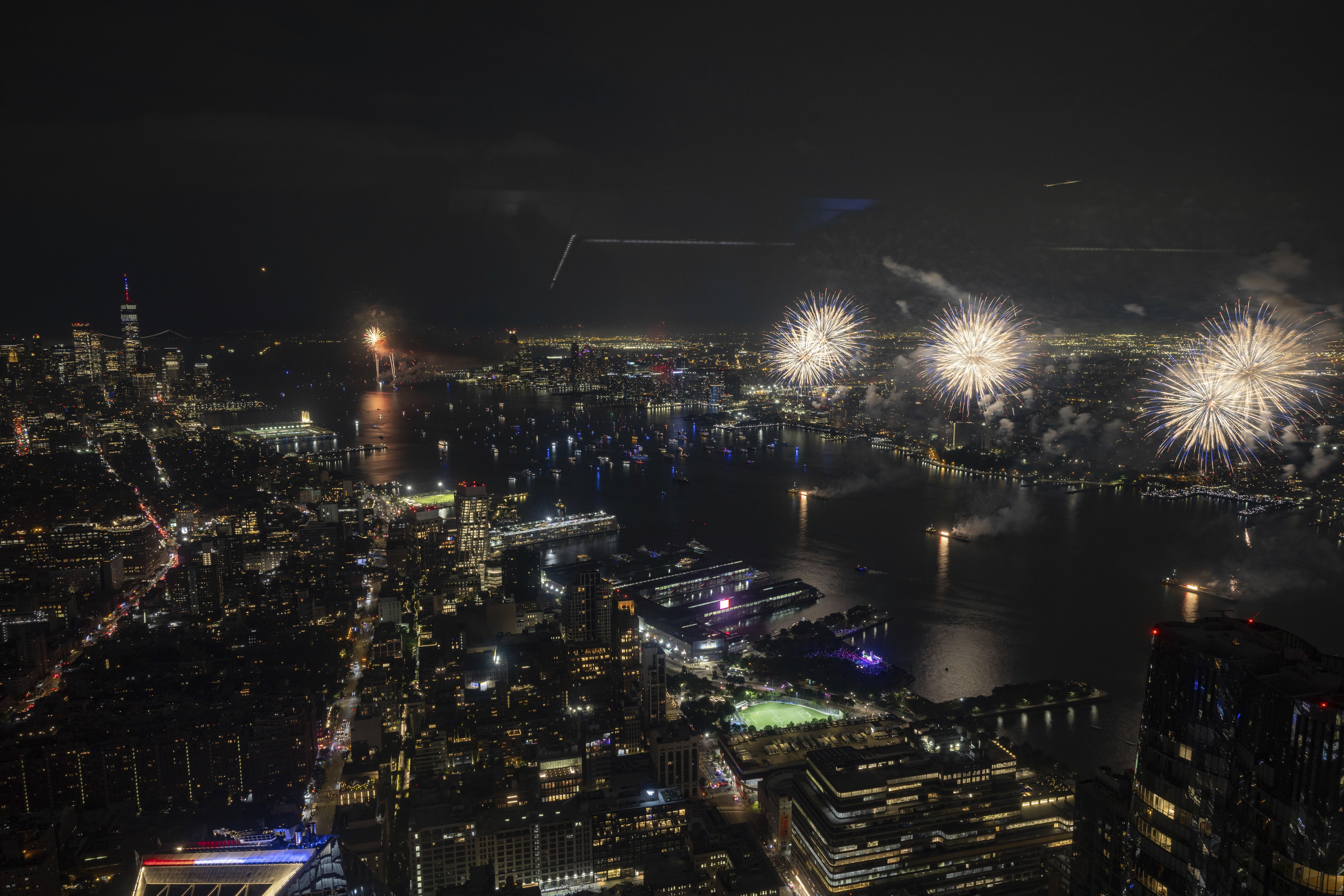 Fireworks go off in the sky during the Macy's Fourth of July fireworks seen at the Edge at Hudson Yards on Thursday, July 4, 2024, in New York. (AP Photo/Yuki Iwamura)