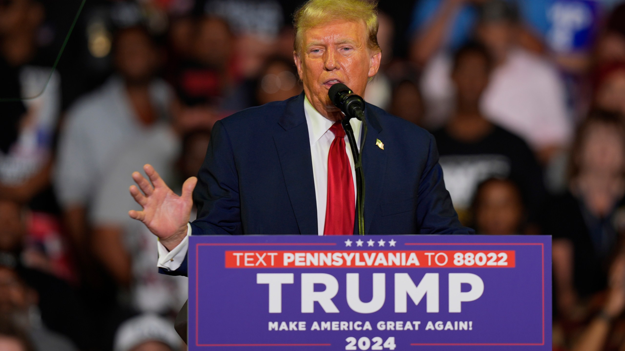 FILE - Republican presidential candidate former President Donald Trump speaks at a campaign rally, June 22, 2024, in Philadelphia. Trump is seeking to distance himself from a plan for a massive overhaul of the federal government drafted by some of his administration officials. Some of these men are expected to take high-level roles if the Republican presumptive nominee is elected back into the White House. Trump is saying on Truth Social that he "knew nothing about Project 2025." (AP Photo/Chris Szagola, File)