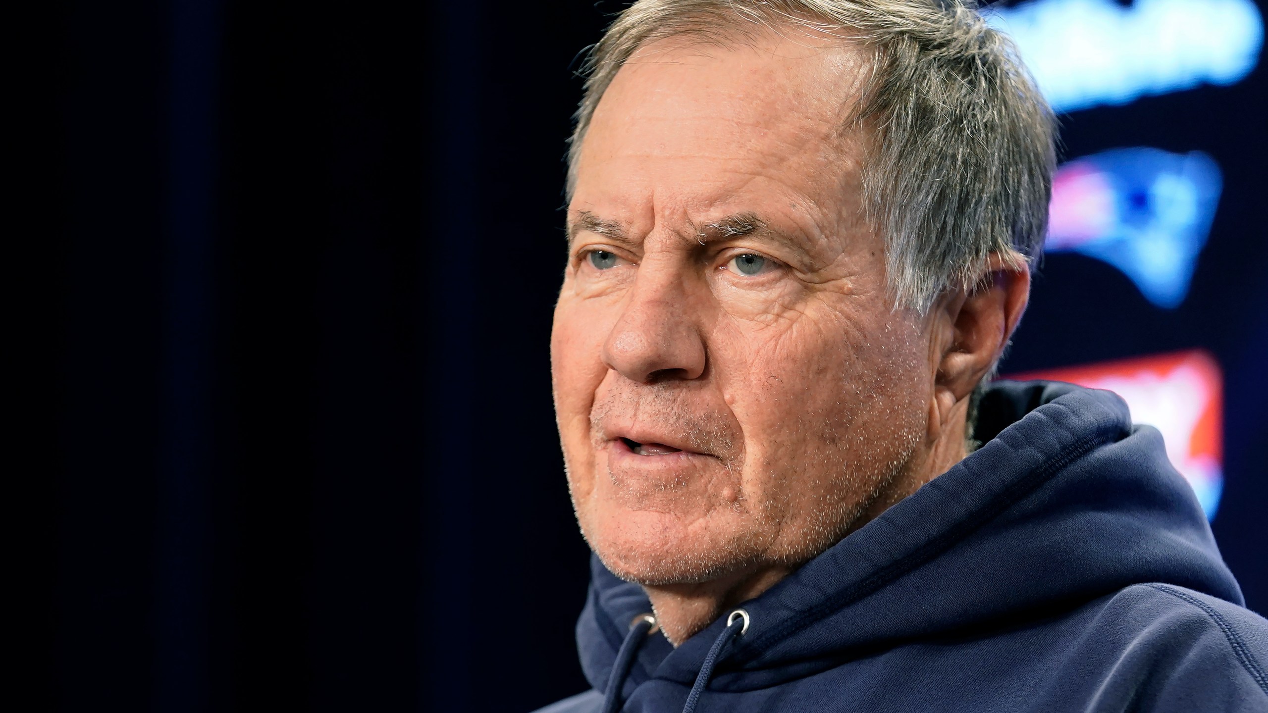 FILE - New England Patriots head coach Bill Belichick speaks with reporters before NFL football practice, Wednesday, Oct. 27, 2021, in Foxborough, Mass. The CW Network announced Thursday, July 11, 2024, that Belichick will be one of the analysts on “Inside the NFL.” (AP Photo/Steven Senne, File)