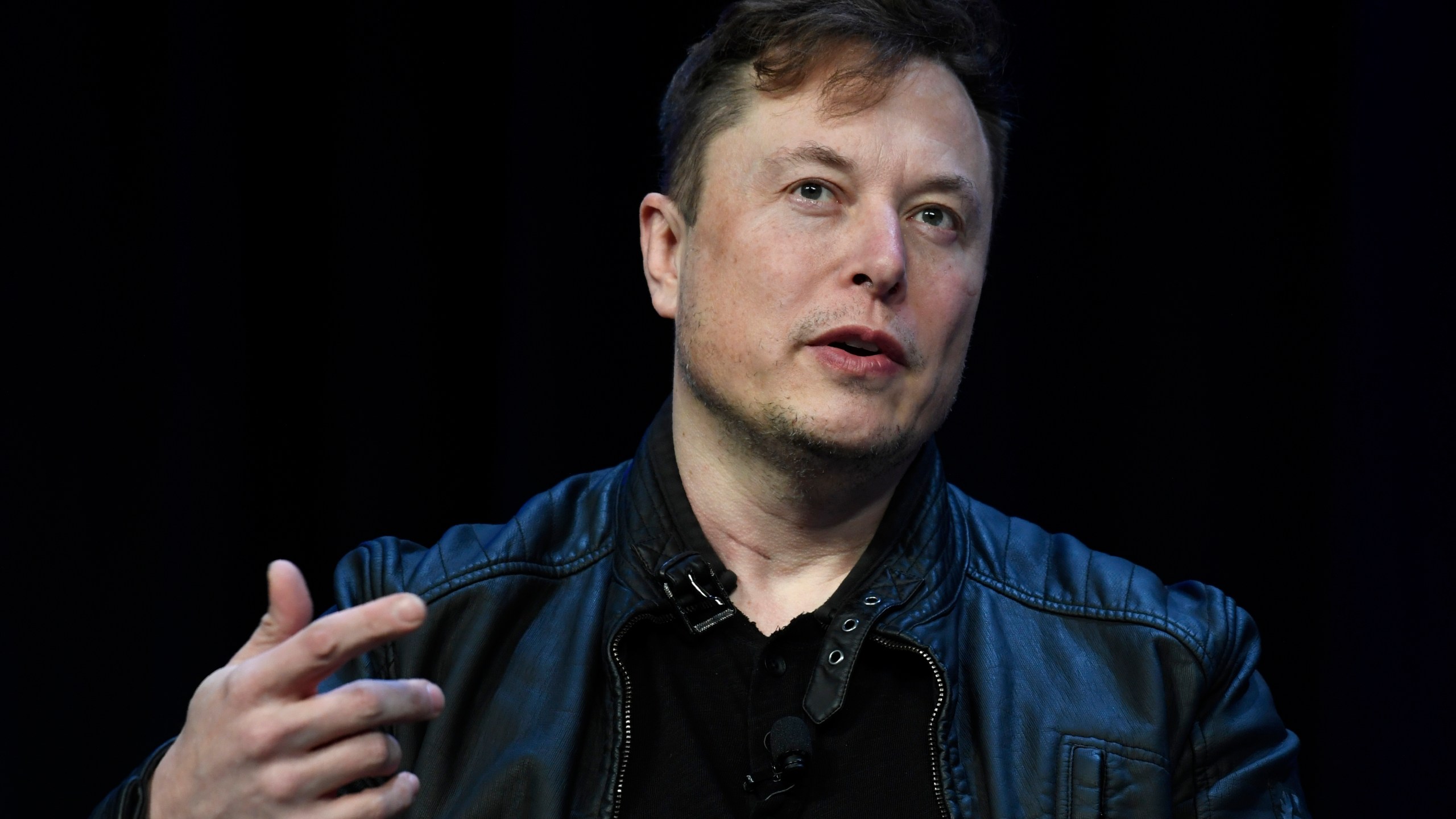 FILE - Tesla and SpaceX CEO Elon Musk speaks at the SATELLITE Conference and Exhibition, March 9, 2020, in Washington. On Monday, July 15, 2024, Musk appeared to confirm a report that the company's much-ballyhooed event to unveil a robotaxi will be delayed beyond its scheduled Aug. 8 date. (AP Photo/Susan Walsh, File)