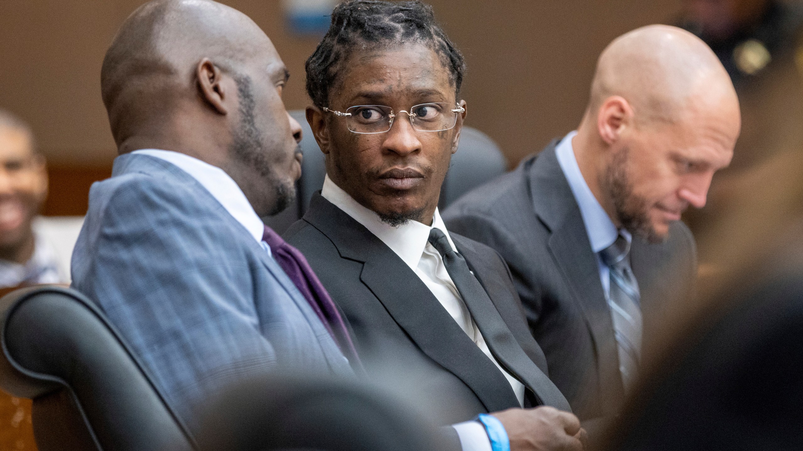 FILE - Young Thug, whose real name is Jeffery Williams, is seen at a hearing, Dec. 22, 2022, in Atlanta. On Monday, July 15, 2024, the judge who has been overseeing the long-running racketeering and gang prosecution against Young Thug and others in Atlanta was removed from the case after two defendants filed motions seeking his recusal citing a meeting the judge held with prosecutors and a state witness. (Arvin Temkar/Atlanta Journal-Constitution via AP, File)