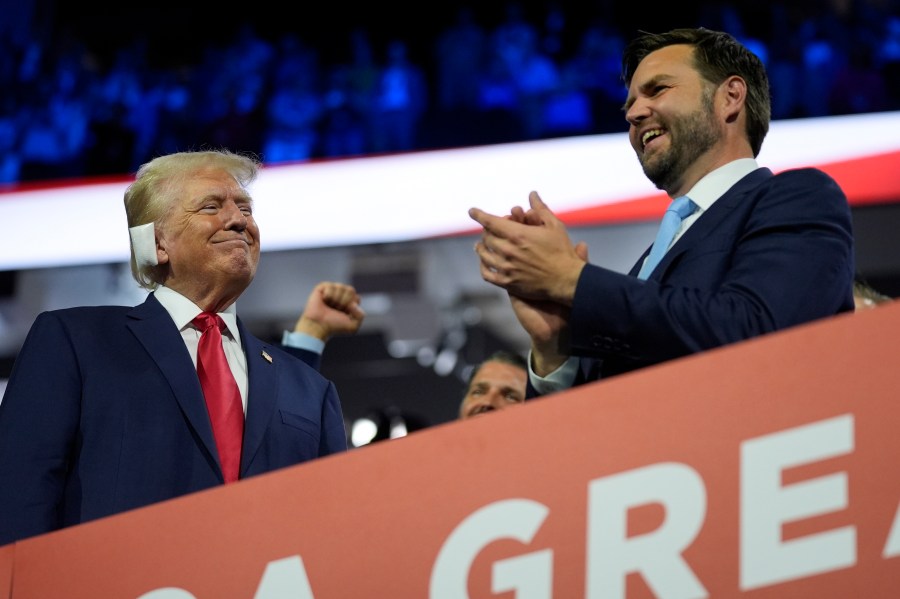 Republican presidential candidate former President Donald Trump and Republican vice presidential candidate Sen. JD Vance, R-Ohio, attend the first day of the Republican National Convention, Monday, July 15, 2024, in Milwaukee. (AP Photo/Evan Vucci)