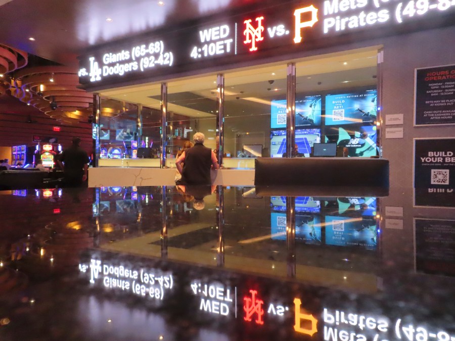 A customer makes a sports bet at the Ocean Casino Resort on Sept. 6, 2022, in Atlantic City, N.J. Sports betting revenue at New Jersey's casinos and horse tracks declined by nearly 24% in June 2024 to just over $27 million, according to figures released by state gambling regulators on July 16, 2024. (AP Photo/Wayne Parry)