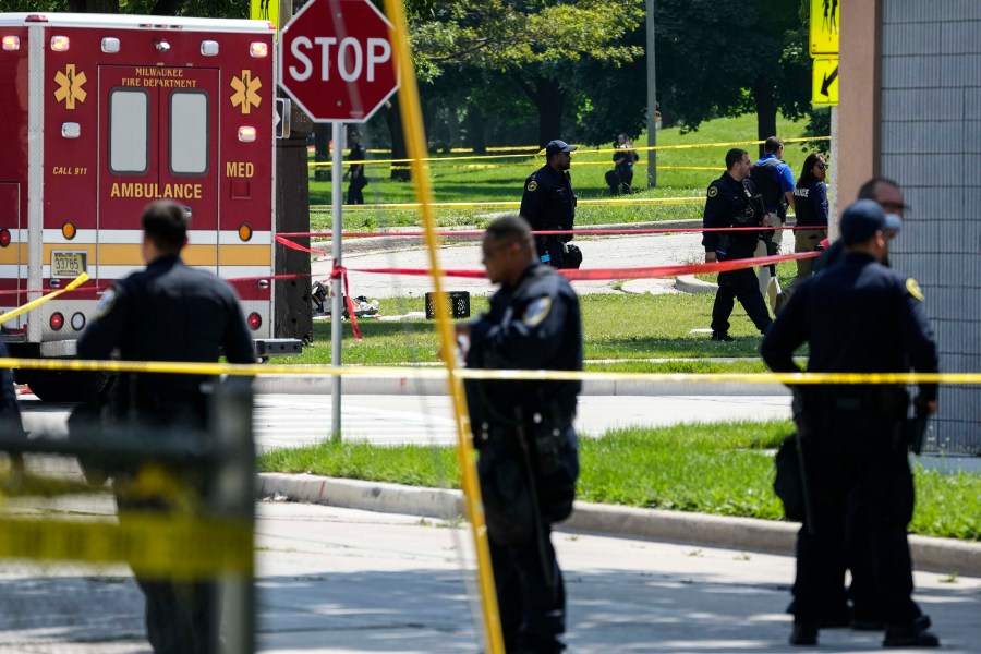 Police investigate a shooting near King Park during the second day of the 2024 Republican National Convention, Tuesday, July 16, 2024, in Milwaukee. The shooting occurred outside of the security perimeter for the Republican National Convention. (AP Photo/Alex Brandon)