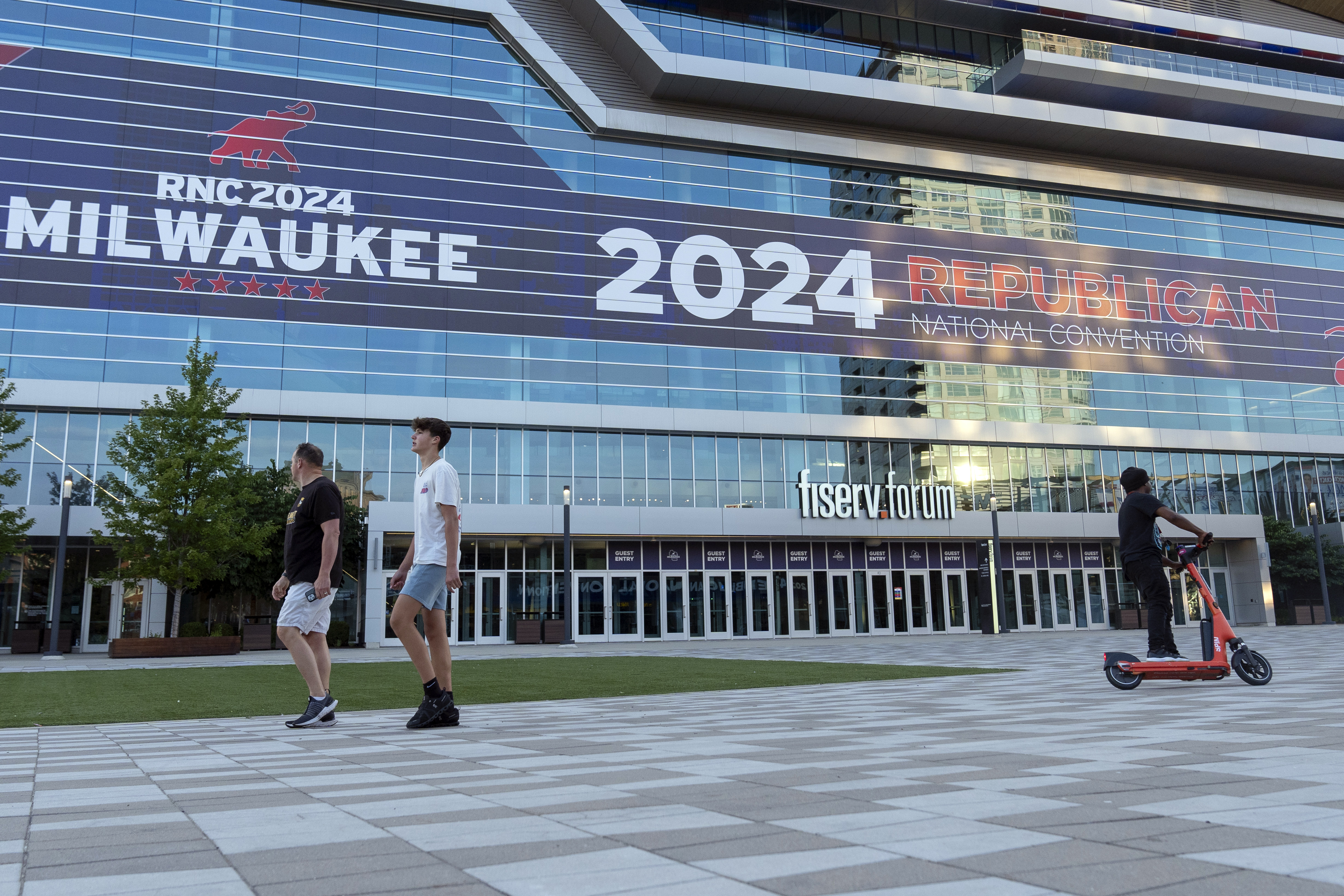 People walk at the Fiserv Forum ahead of the 2024 Republican National Convention, Thursday, July 11, 2024, in Milwaukee. (AP Photo/Alex Brandon)