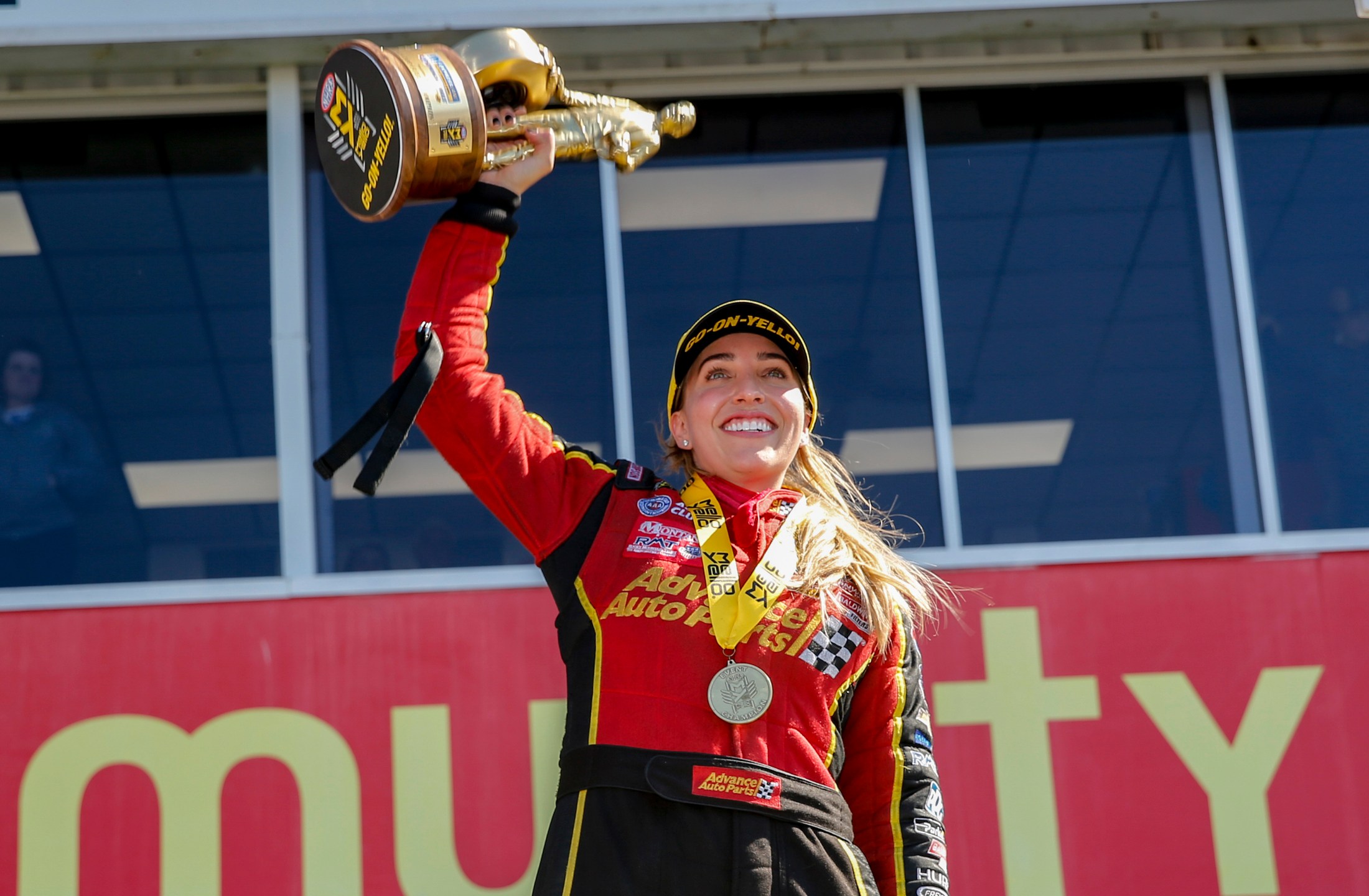 FILE - In this photo provided by the NHRA, Brittany Force celebrates her win in the Top Fuel final in the Mopar Express Lane NHRA SpringNationals in Baytown, Texas, Sunday, April 14, 2019. Brittany Force will return to her Top Fuel dragster this week in Seattle, her first time competing since her father John's horrific accident in Virginia last month. (Randy Anderson/NHRA via AP, File)