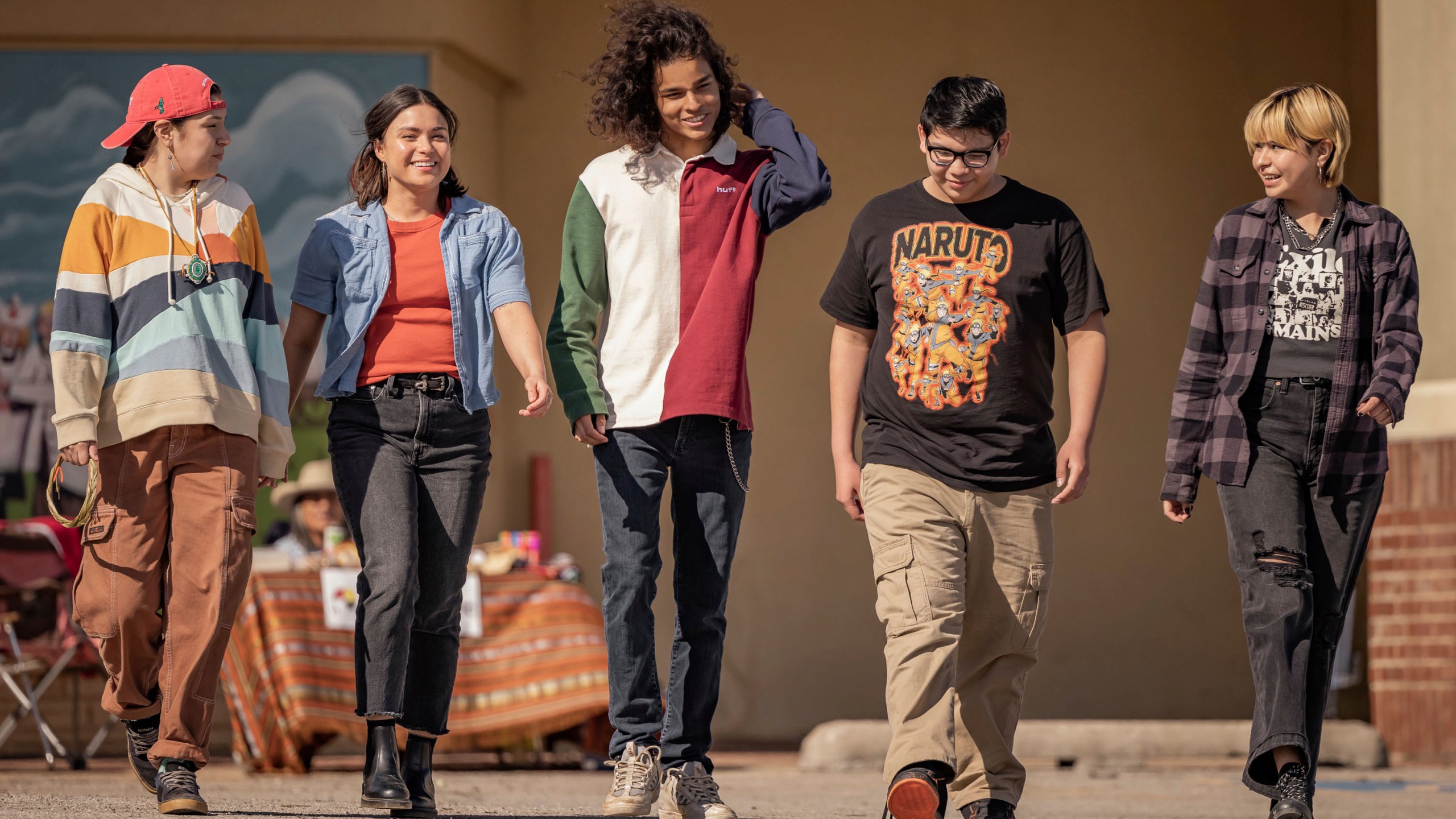 This image released by FX shows, from left, Paulina Alexis, Devery Jacobs, D'Pharaoh Woon-A-Tai, Lane Factor and Elva Guerra in a scene from "Reservation Dogs." (Shane Brown/FX via AP)