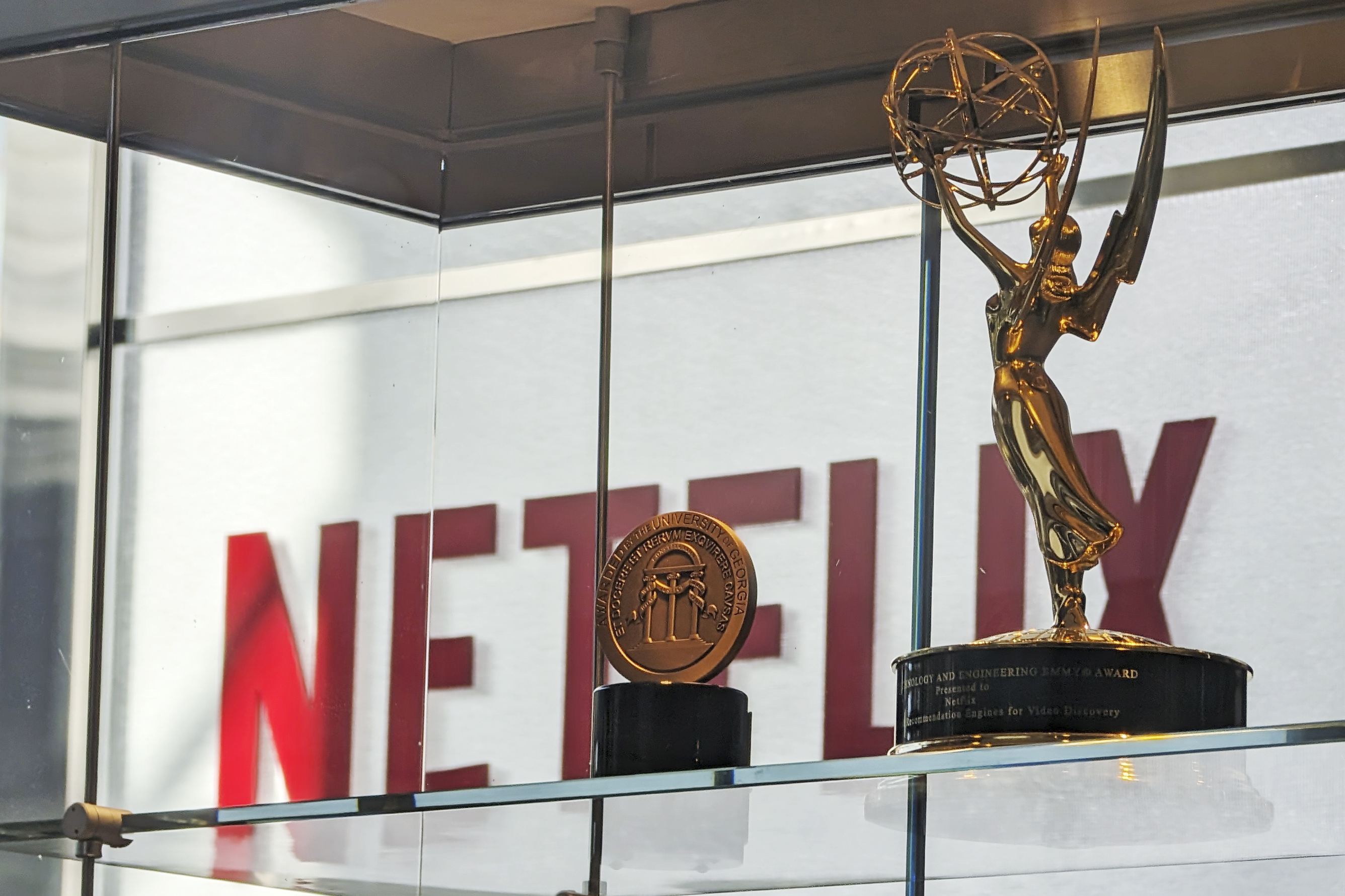 FILE - Awards, including an Emmy, are displayed at Netflix headquarters Los Gatos, Calif. on March 7, 2024. Netflix reports earnings on Thursday, July 18, 2024. (AP Photo/Mike Liedtke, File)