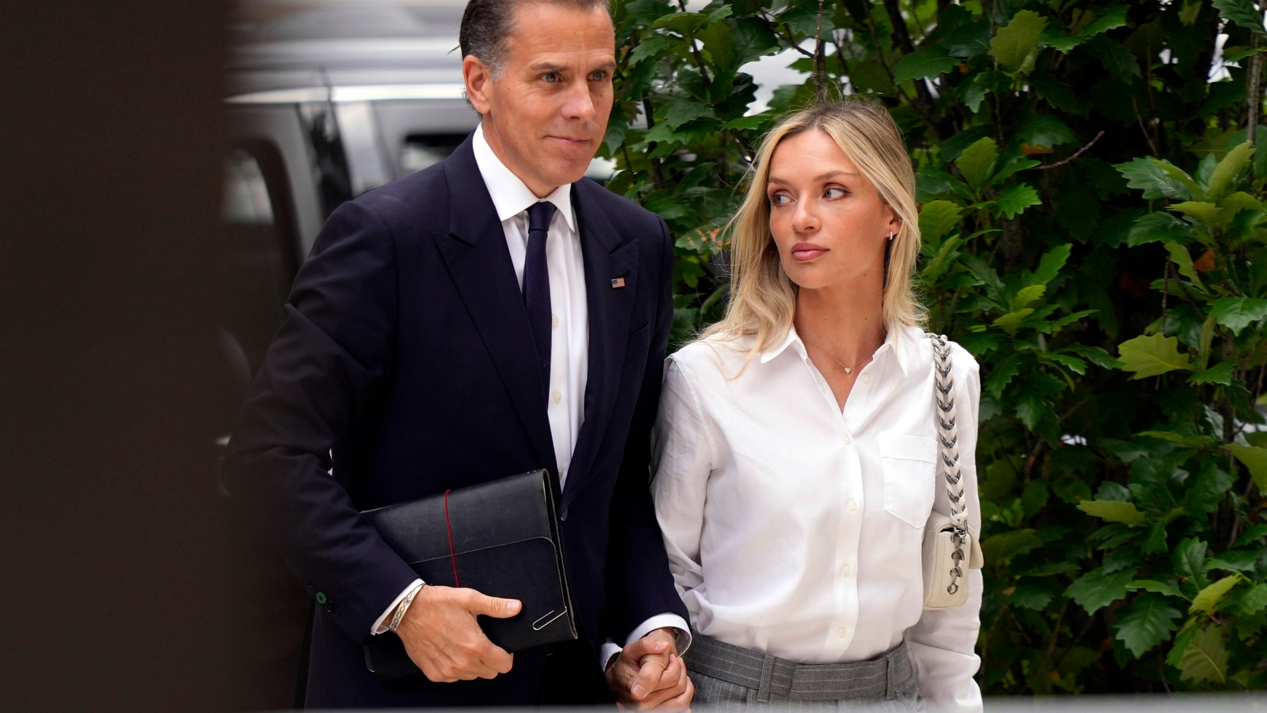 FILE — Hunter Biden arrives at federal court with his wife, Melissa Cohen Biden, June 11, 2024, in Wilmington, Del. (AP Photo/Matt Slocum, File)