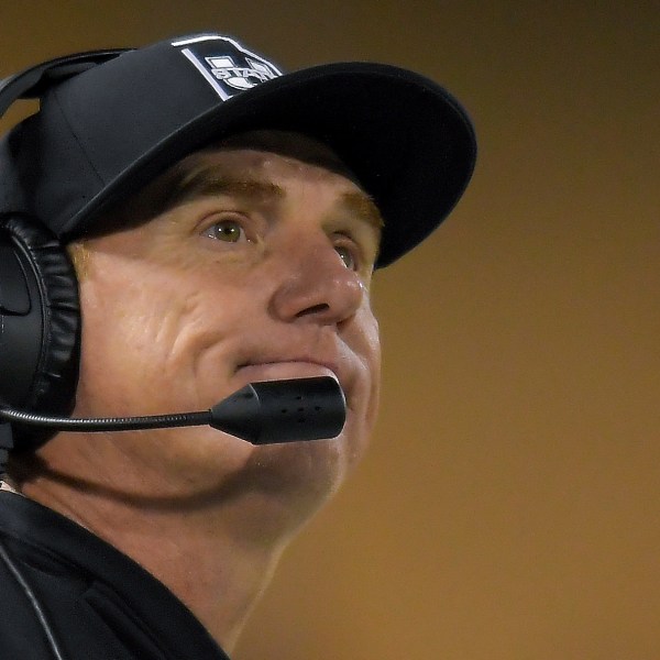 FILE - Utah State coach Blake Anderson reacts to a penalty during the second half of the team's NCAA college football game against Boise State on Saturday, Nov. 18, 2023, in Logan, Utah. Utah State says it’s firing Blake Anderson after an external review of allegations that he hadn’t complied with Title IX policies regarding the reporting of sexual misconduct cases. Defensive coordinator and defensive ends coach Nate Dreiling will be Utah State’s interim head coach during the upcoming season.(Eli Lucero/The Herald Journal via AP, File)