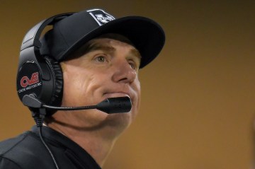 FILE - Utah State coach Blake Anderson reacts to a penalty during the second half of the team's NCAA college football game against Boise State on Saturday, Nov. 18, 2023, in Logan, Utah. Utah State says it’s firing Blake Anderson after an external review of allegations that he hadn’t complied with Title IX policies regarding the reporting of sexual misconduct cases. Defensive coordinator and defensive ends coach Nate Dreiling will be Utah State’s interim head coach during the upcoming season.(Eli Lucero/The Herald Journal via AP, File)