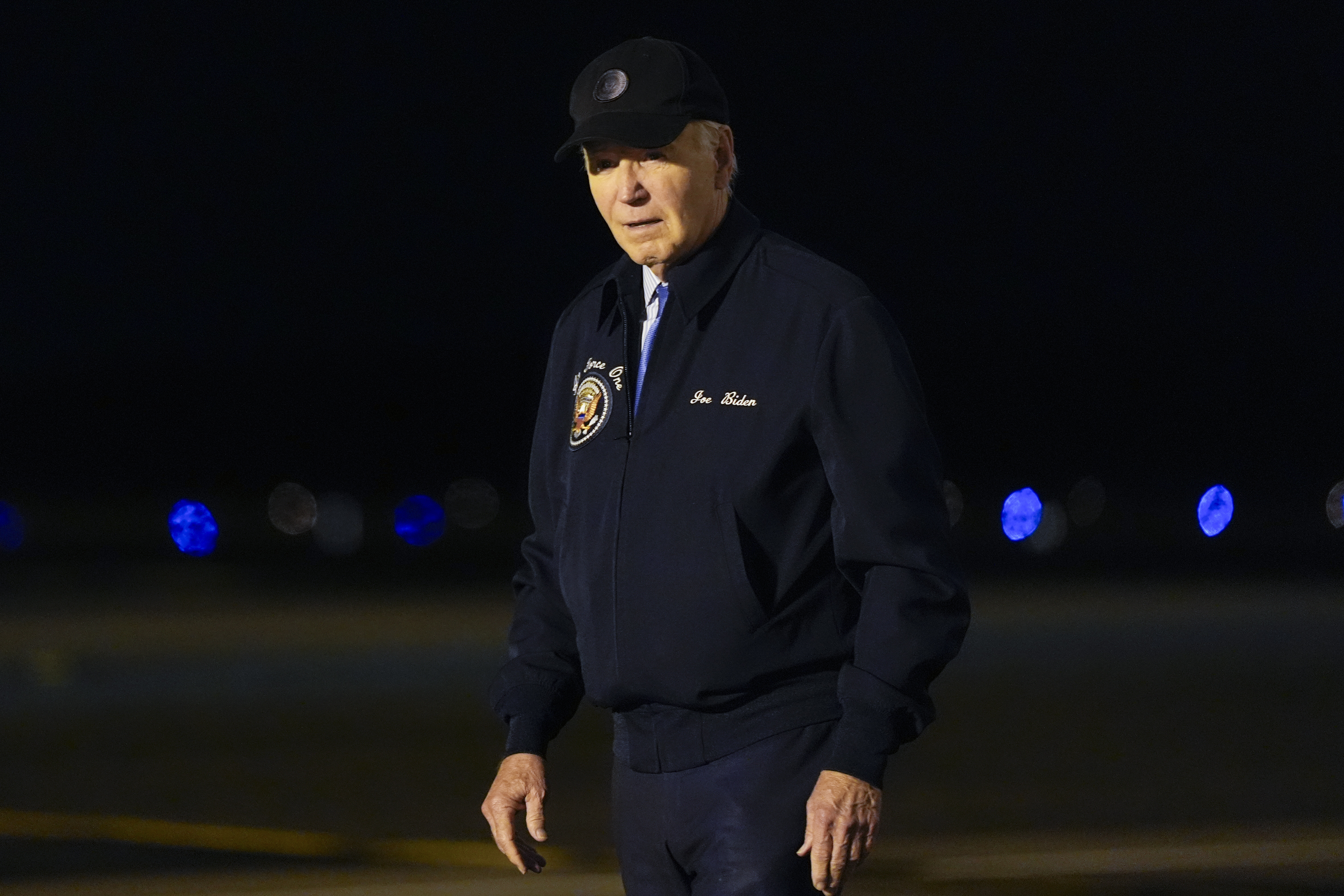President Joe Biden walks to his car after stepping off of Air Force One at Dover Air Force Base in Delaware, Wednesday, July 17, 2024. Biden is returning to his home in Rehoboth Beach, Del., to self-isolate after testing positive for COVID-19. (AP Photo/Susan Walsh)