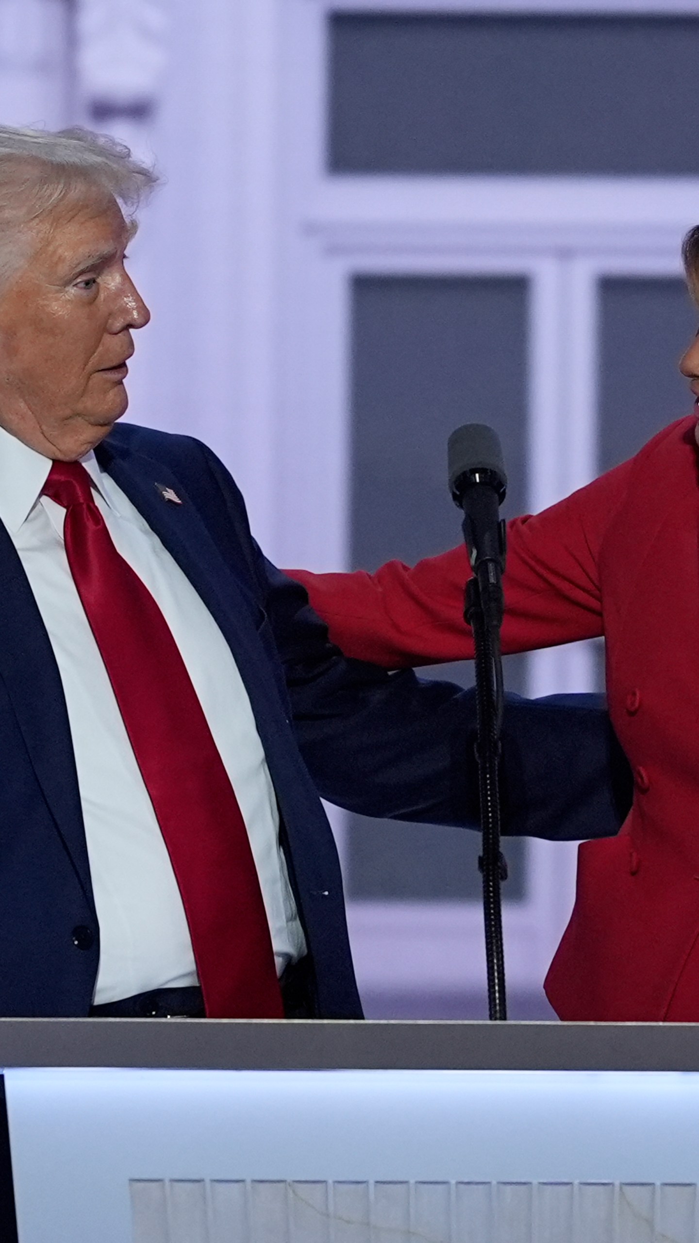 Republican presidential candidate former President Donald Trump is joined on stage by former first lady Melania Trump at the Republican National Convention Thursday, July 18, 2024, in Milwaukee. (AP Photo/J. Scott Applewhite)