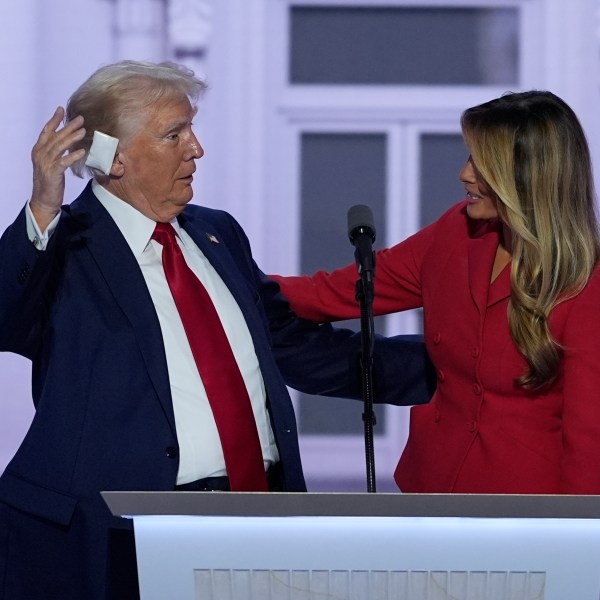 Republican presidential candidate former President Donald Trump is joined on stage by former first lady Melania Trump at the Republican National Convention Thursday, July 18, 2024, in Milwaukee. (AP Photo/J. Scott Applewhite)