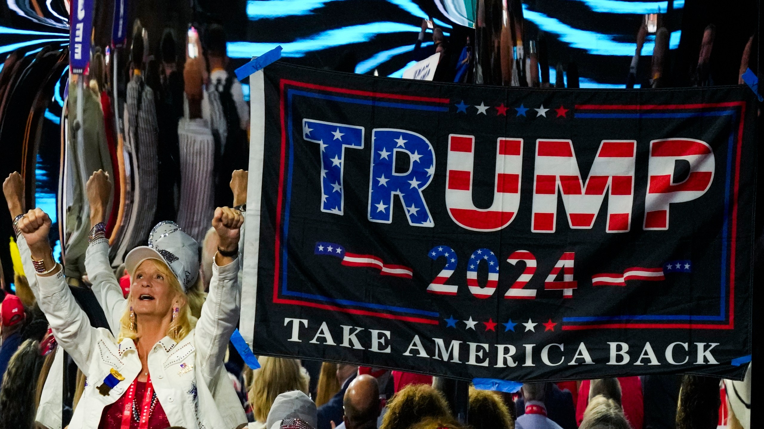 A supporter cheers during the Republican National Convention Thursday, July 18, 2024, in Milwaukee. (AP Photo/Charles Rex Arbogast)