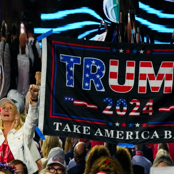 A supporter cheers during the Republican National Convention Thursday, July 18, 2024, in Milwaukee. (AP Photo/Charles Rex Arbogast)