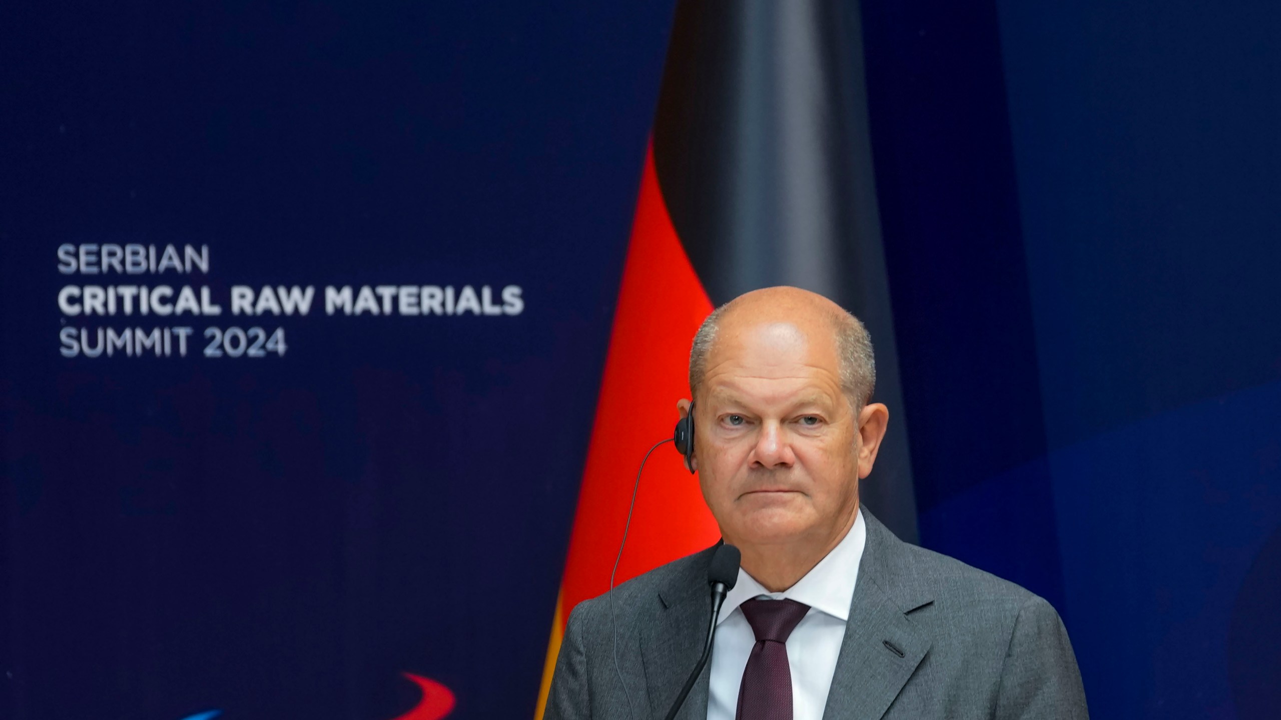 German Chancellor Olaf Scholz listens to Serbian President Aleksandar Vucic during a press conference after their official talks at the Serbia Palace in Belgrade, Serbia, Friday, July 19, 2024. Scholz visits Serbia to discuss a tentative deal with the Balkan country for the controversial excavation of lithium, a critical substance in making batteries for electric vehicles. (AP Photo/Darko Vojinovic)