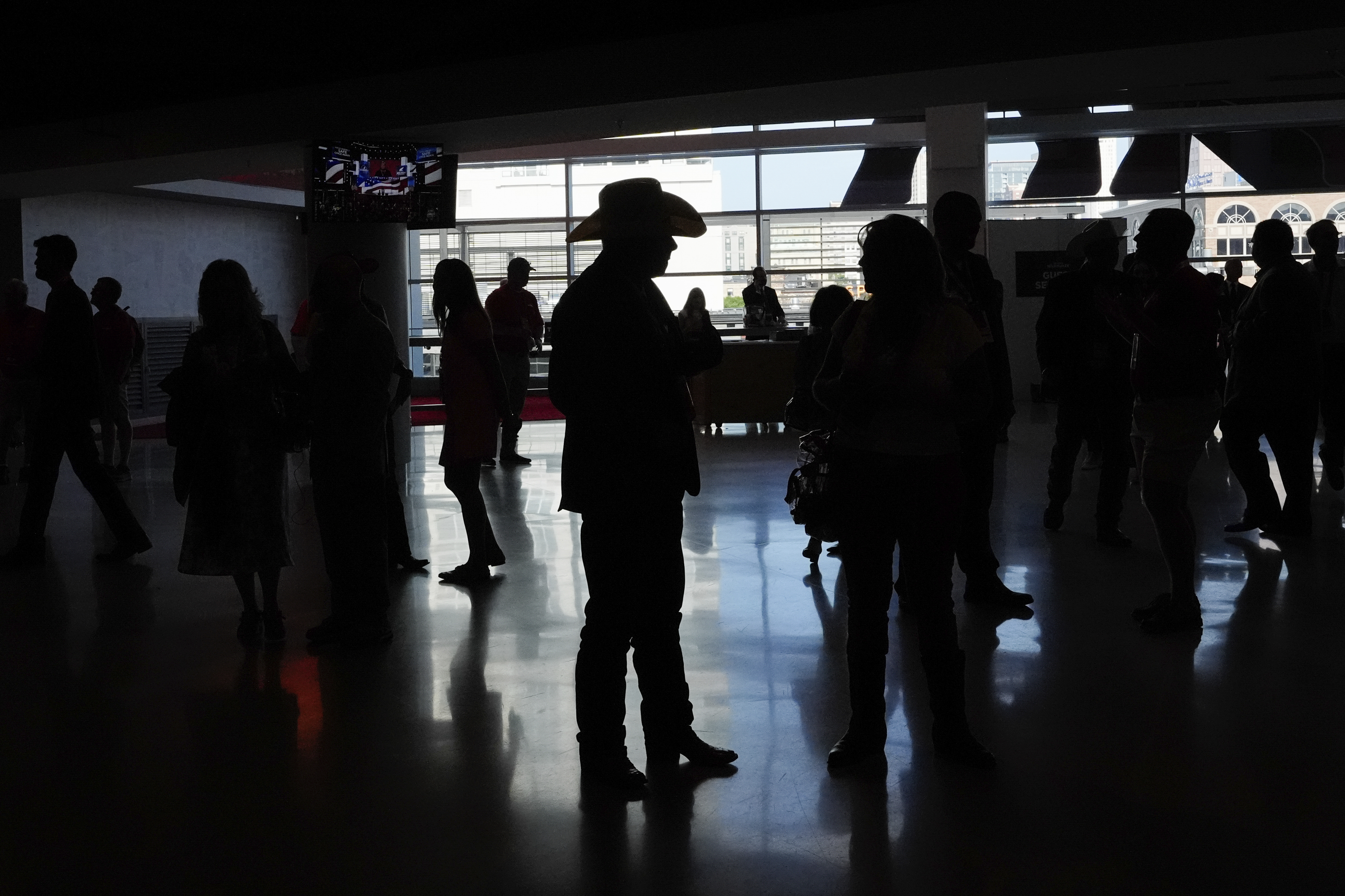 Delegates arrive at the Republican National Convention Tuesday, July 16, 2024, in Milwaukee. (AP Photo/Nam Y. Huh)