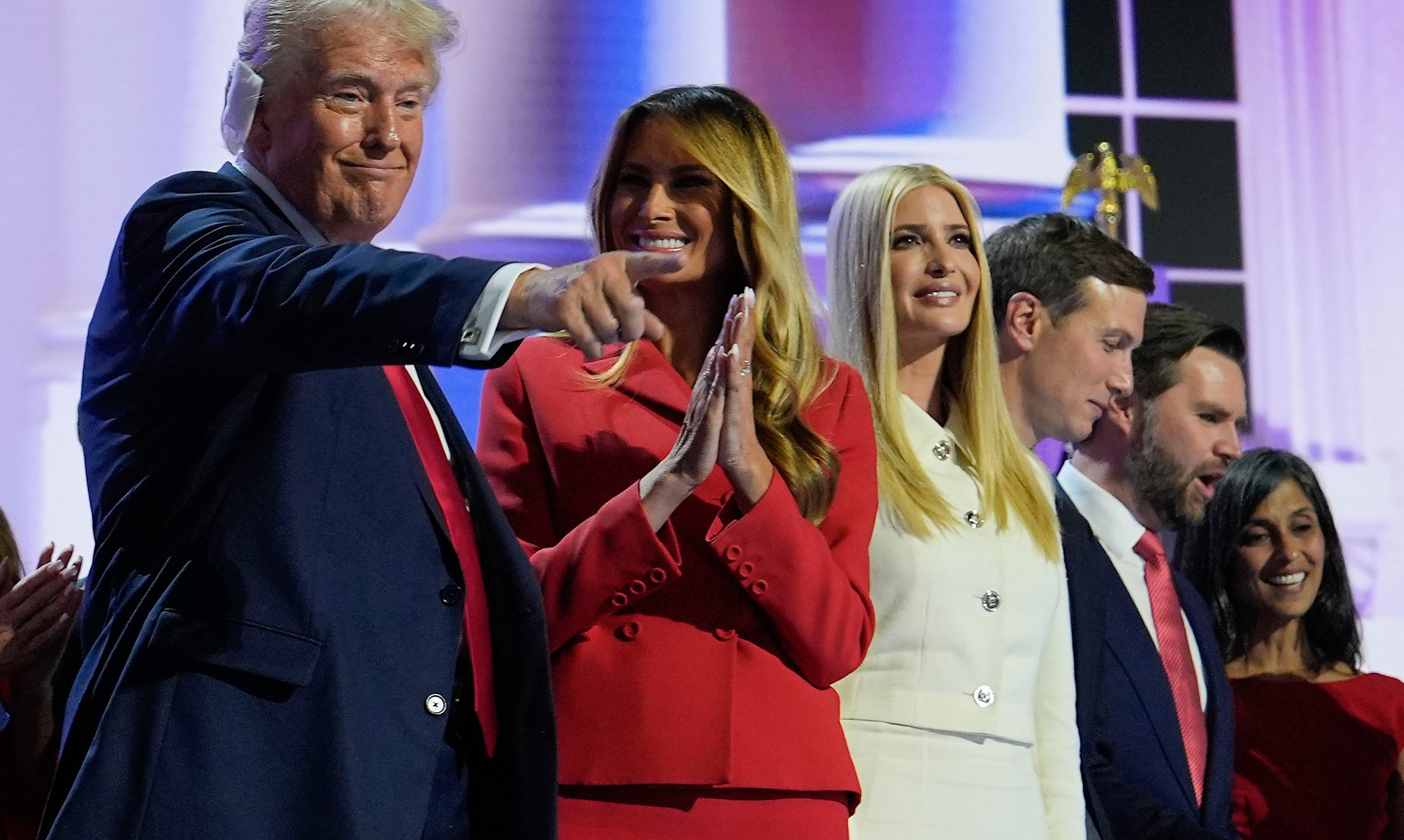 Republican presidential candidate former President Donald Trump, left, stands on stage with Melania Trump, Ivanka Trump, Jared Kushner and Republican vice presidential candidate Sen. JD Vance, R-Ohio, after speaking during the Republican National Convention, Thursday, July 18, 2024, in Milwaukee. (AP Photo/Julia Nikhinson)