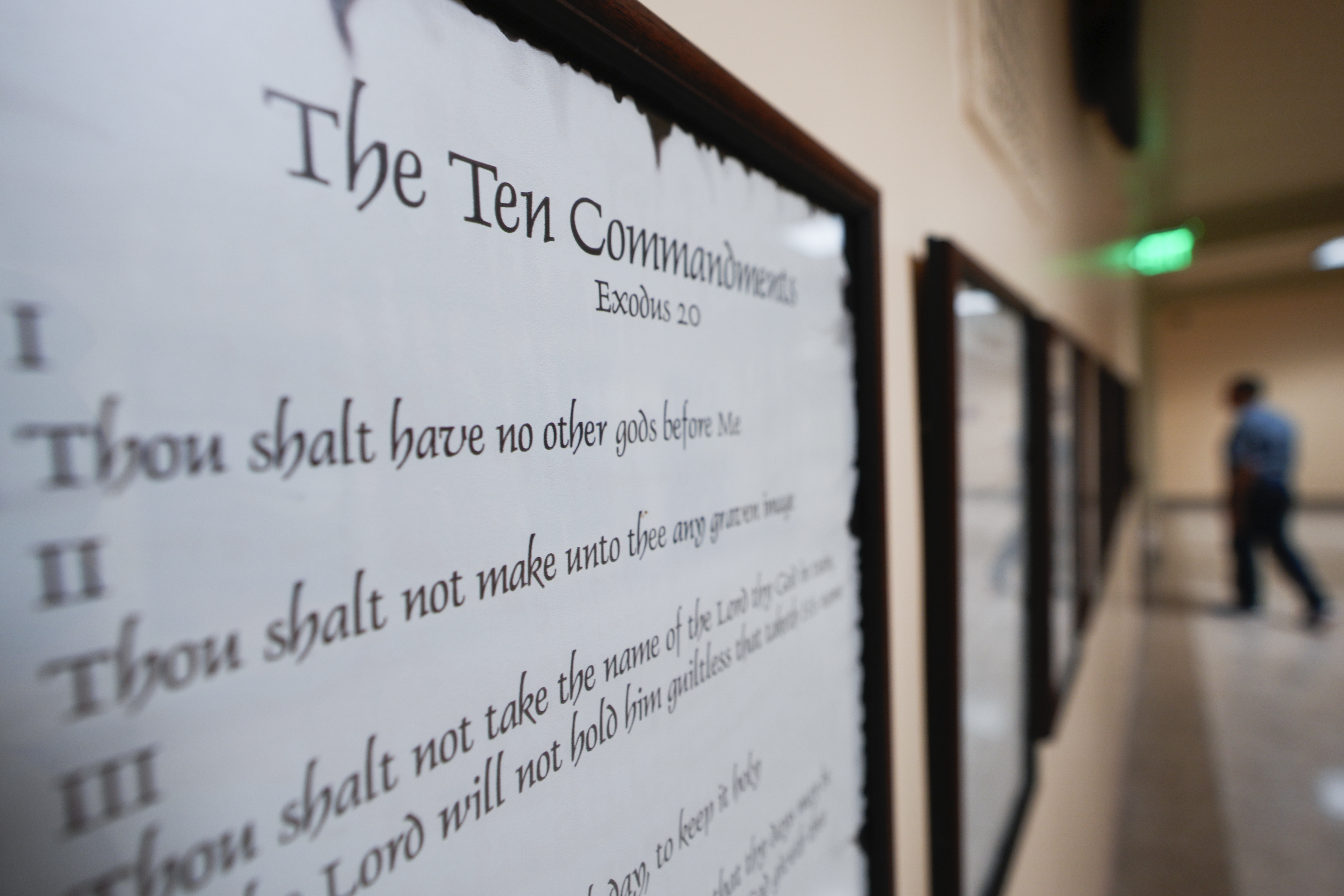 FILE - A copy of the Ten Commandments is posted along with other historical documents in a hallway of the Georgia Capitol, Thursday, June 20, 2024, in Atlanta. Louisiana agreed Friday, July 19, 2024 to delay implementing a requirement that the Ten Commandments be placed in all of the state’s public school classrooms until at least November, as a lawsuit makes its way through the courts. (AP Photo/John Bazemore, File)