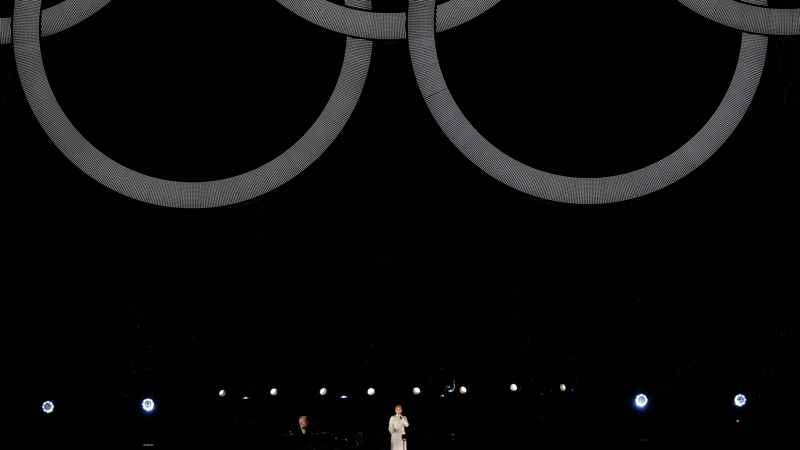 Celine Dion performs in Paris, France, during the opening ceremony of the 2024 Summer Olympics, Friday, July 26, 2024. (AP Photo/David J. Phillip)