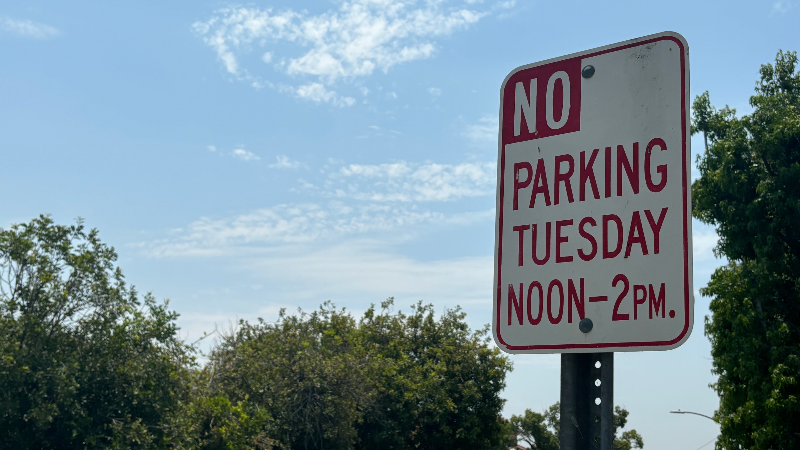 A No Parking sign with Tuesday restrictions in Los Angeles County shown on July 11, 2024. (KTLA)