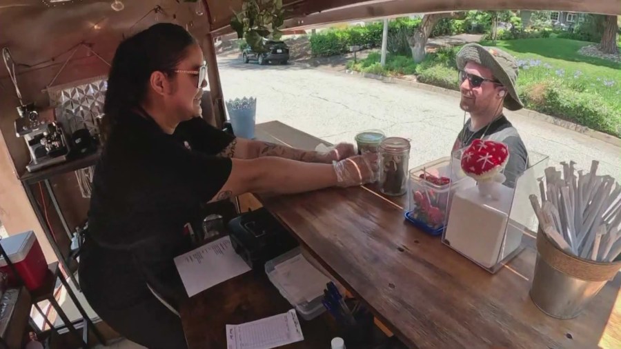 The young entrepreneurs of Ka-Ibigan Cafe serving handcrafted coffee drinks in Altadena. (KTLA)