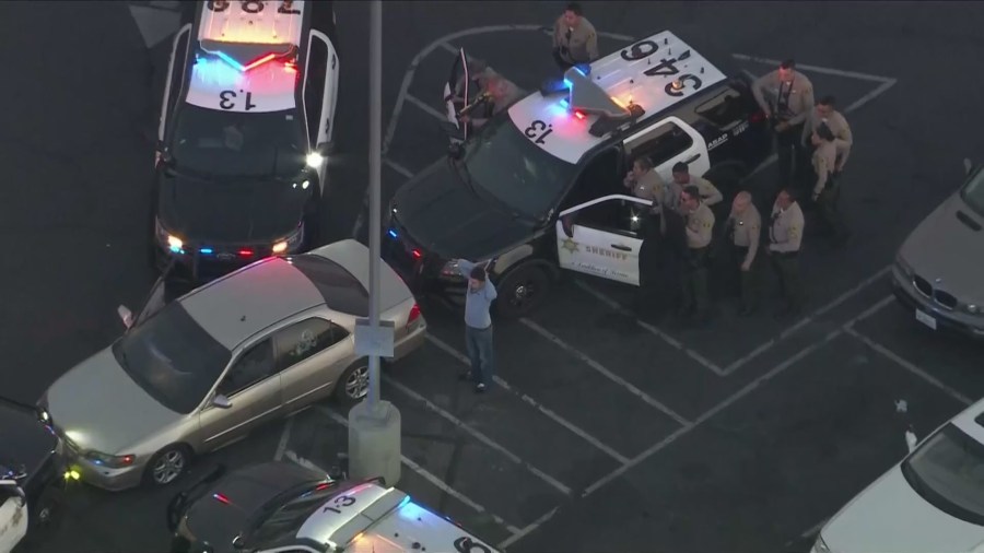 The male driver eventually surrendered to deputies. (KTLA)