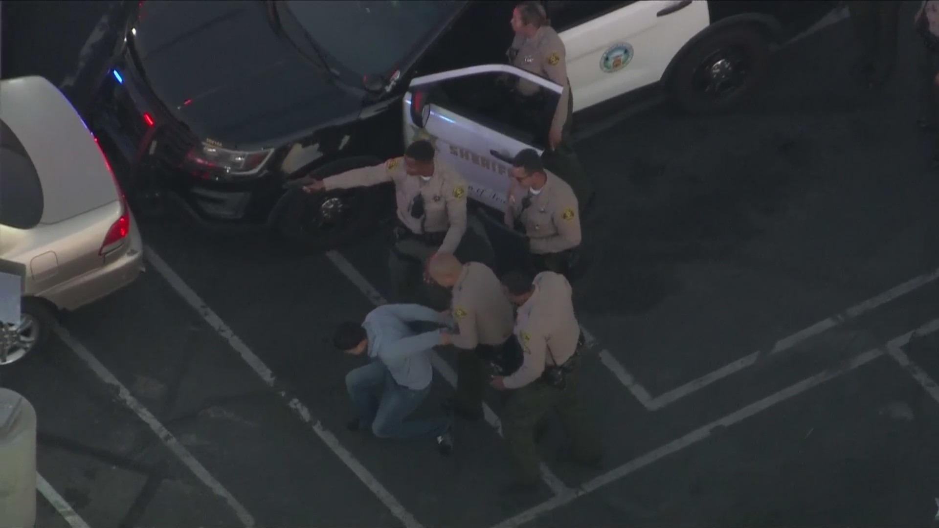 The male driver eventually surrendered to deputies. (KTLA)