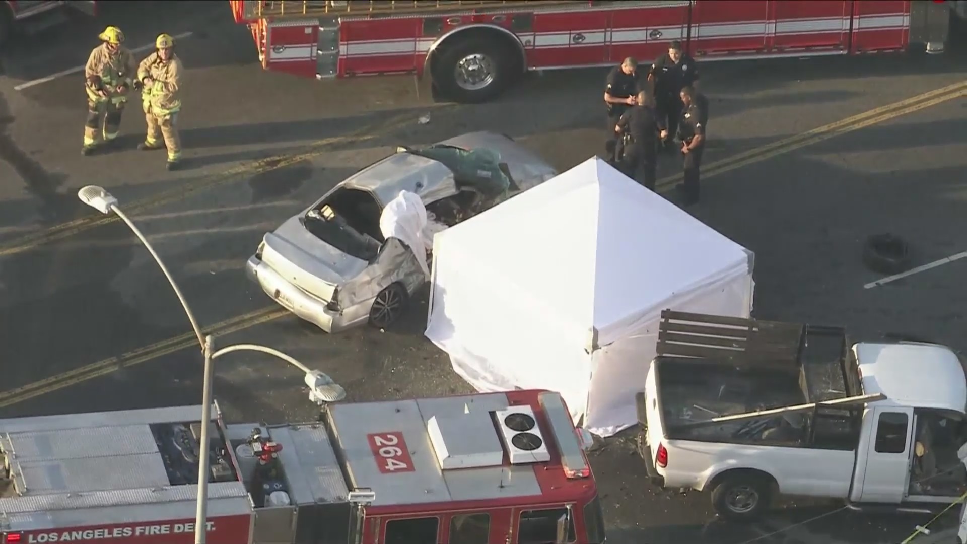 A three-car collision killed a 12-year-old girl and left nine other people hospitalized in South Los Angeles on July 5, 2024. (KTLA)