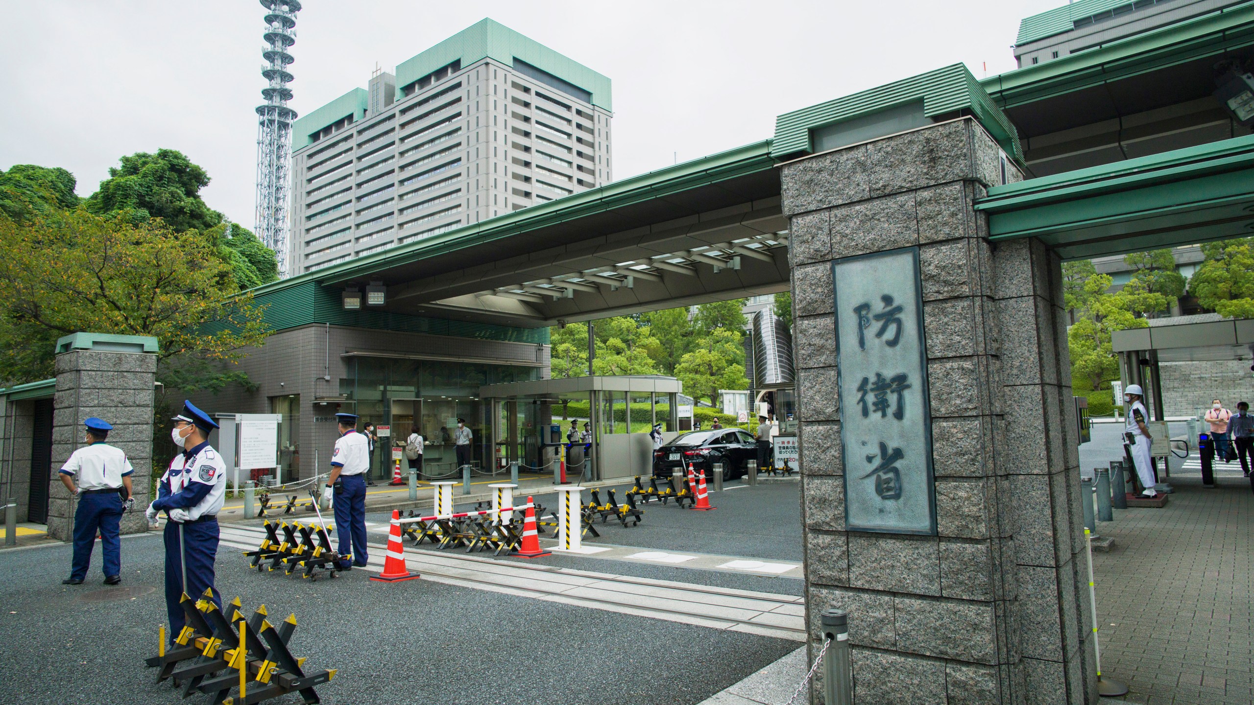 FILE - This photo shows an exterior view of the Defense Ministry of Japan with its sign at the main entrance in Tokyo on Sept. 17, 2021. (AP Photo/Hiro Komae, File)