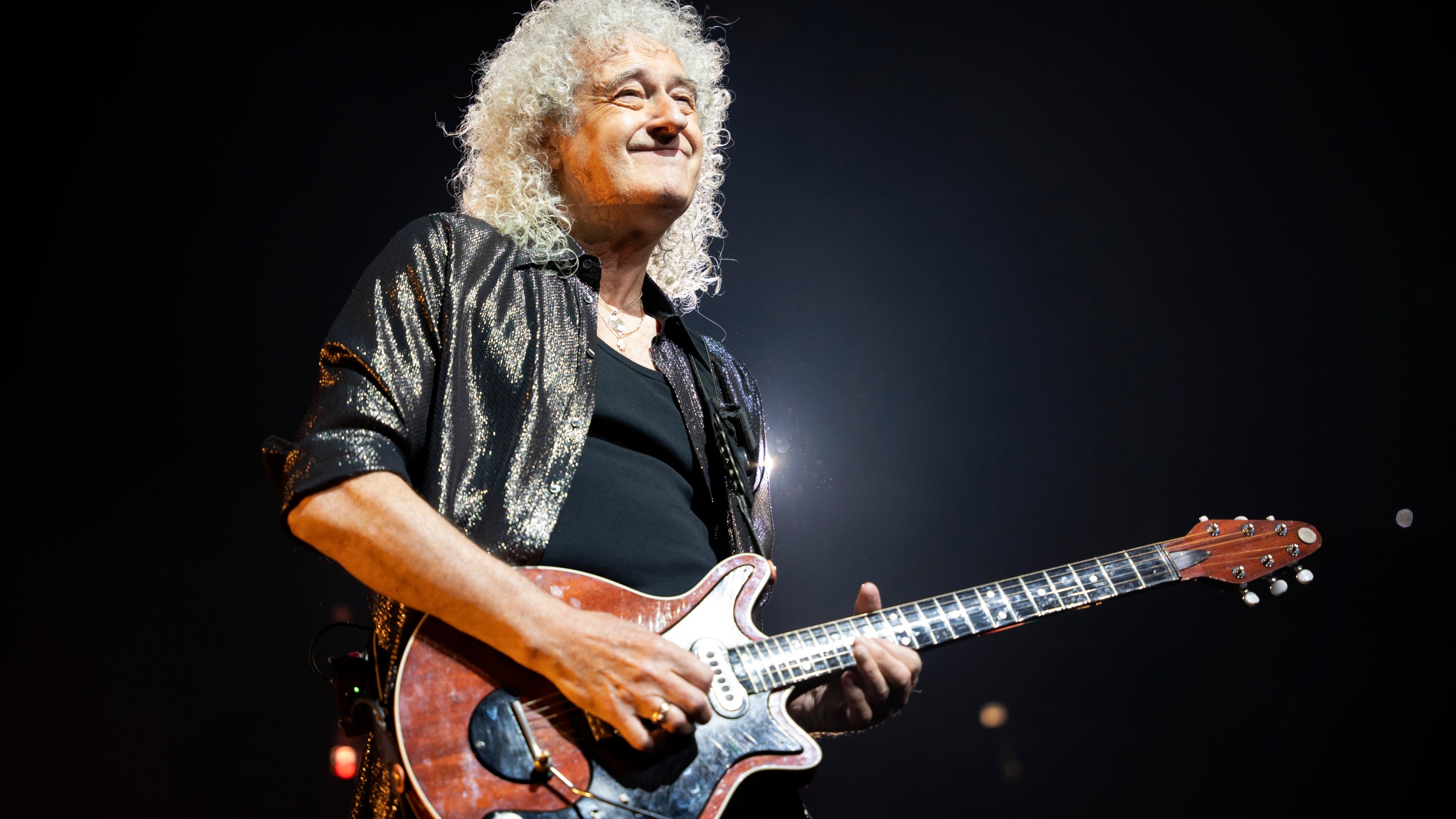 FILE - Brian May of Queen performs during the "Rhapsody" tour on Oct. 30, 2023, in Chicago. (Photo by Rob Grabowski/Invision/AP, File)