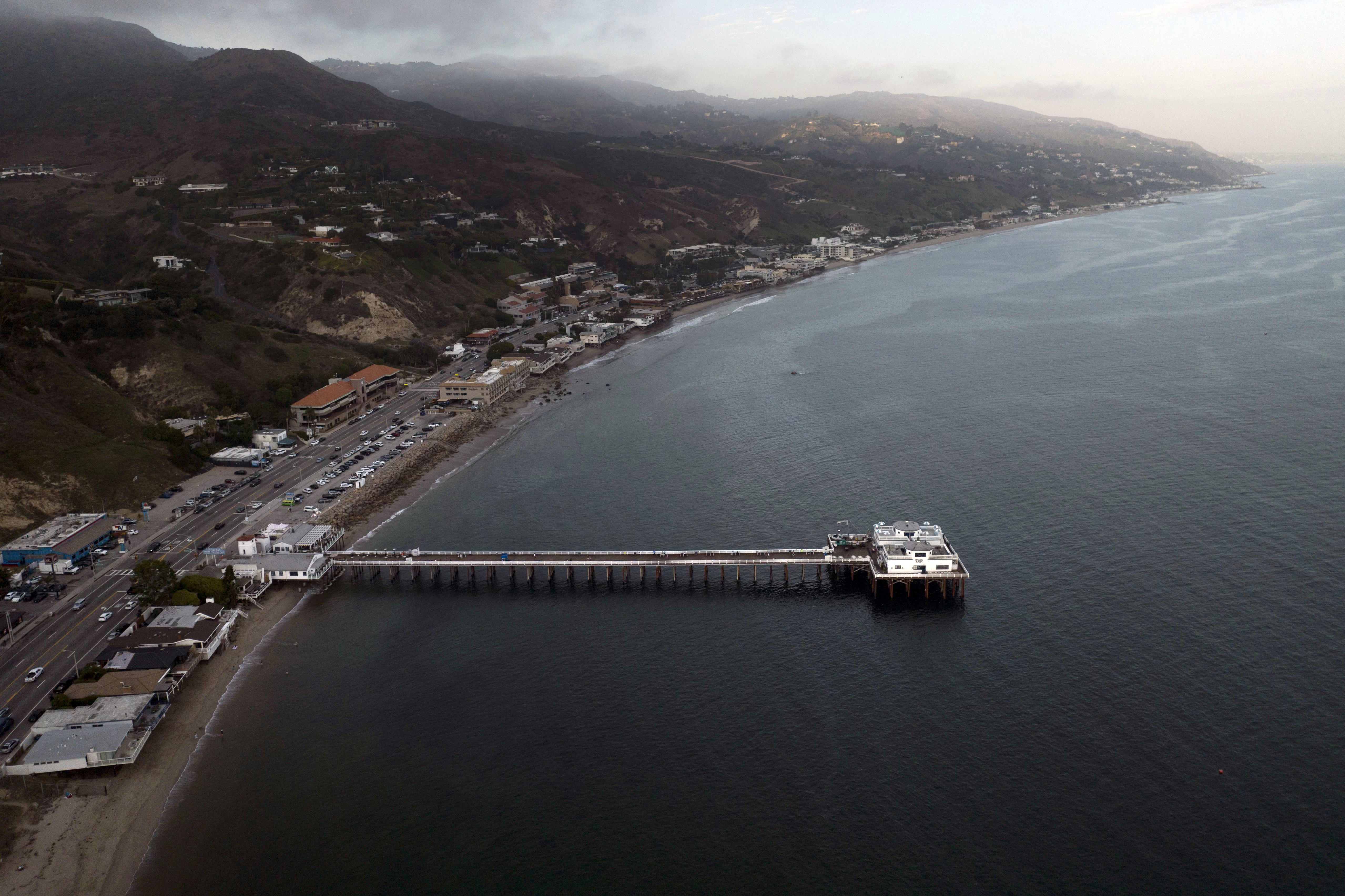 FILE - This aerial view shows the Malibu Pier in Malibu, Calif., Thursday, Aug. 31, 2023. (AP Photo/Jae C. Hong, File)