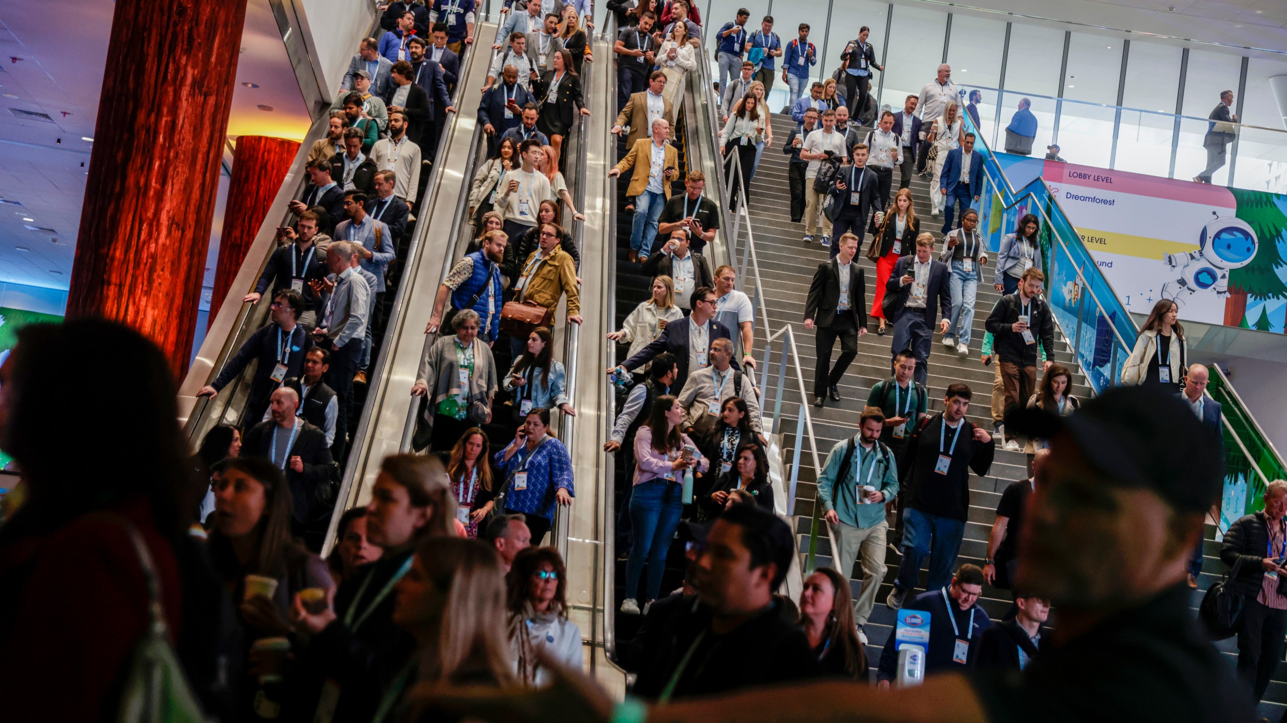 Thousands make their way to the Moscone South Hall in preparation for keynote speakers, including Salesforce CEO Marc Benioff, during Dreamforce in San Francisco on Tuesday, Sept. 17, 2024. (Brontë Wittpenn/San Francisco Chronicle via AP)