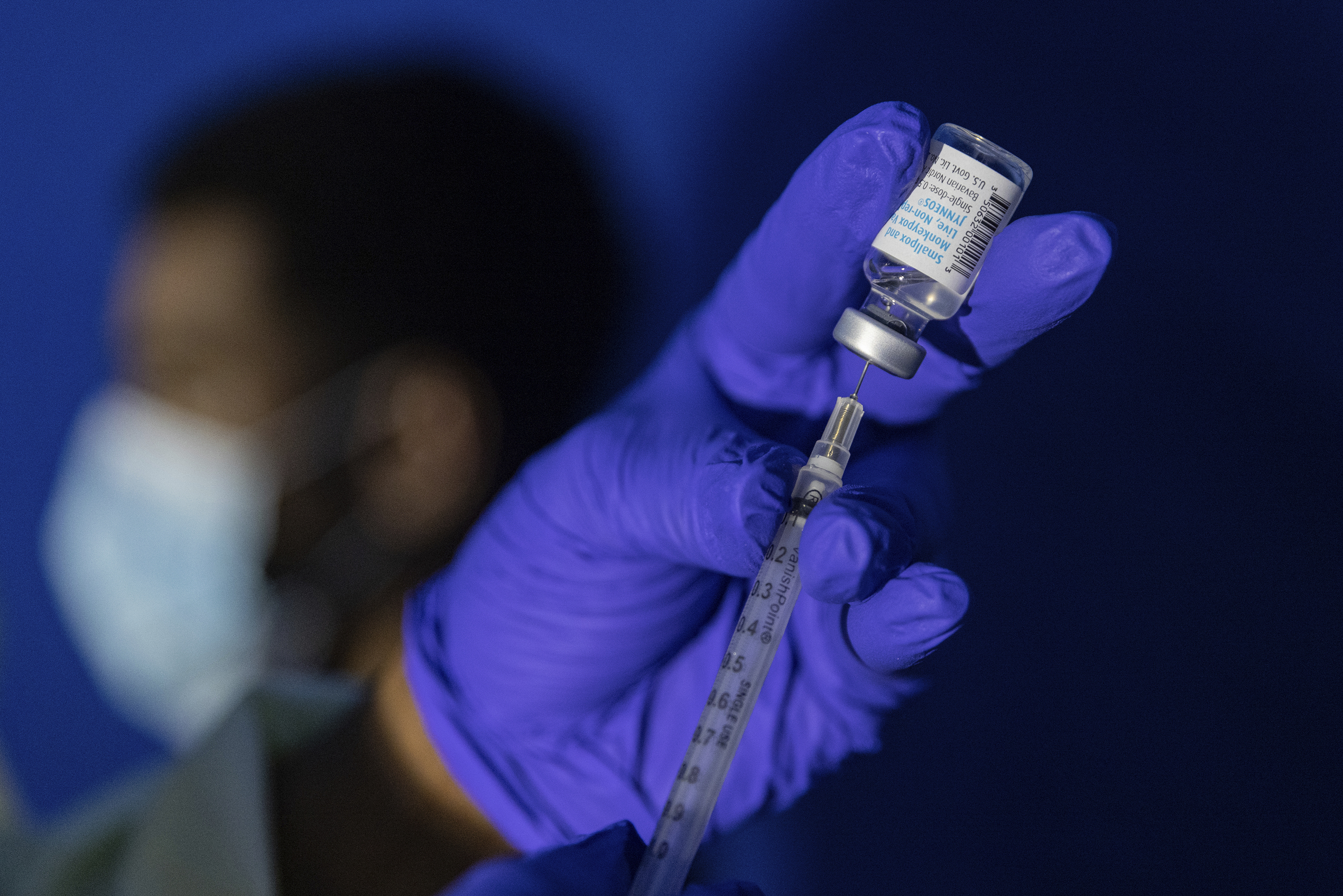 FILE - Family nurse practitioner Carol Ramsubhag-Carela prepares a syringe with the Mpox vaccine before inoculating a patient at a vaccinations site on Aug. 30, 2022, in the Brooklyn borough of New York. (AP Photo/Jeenah Moon, File)