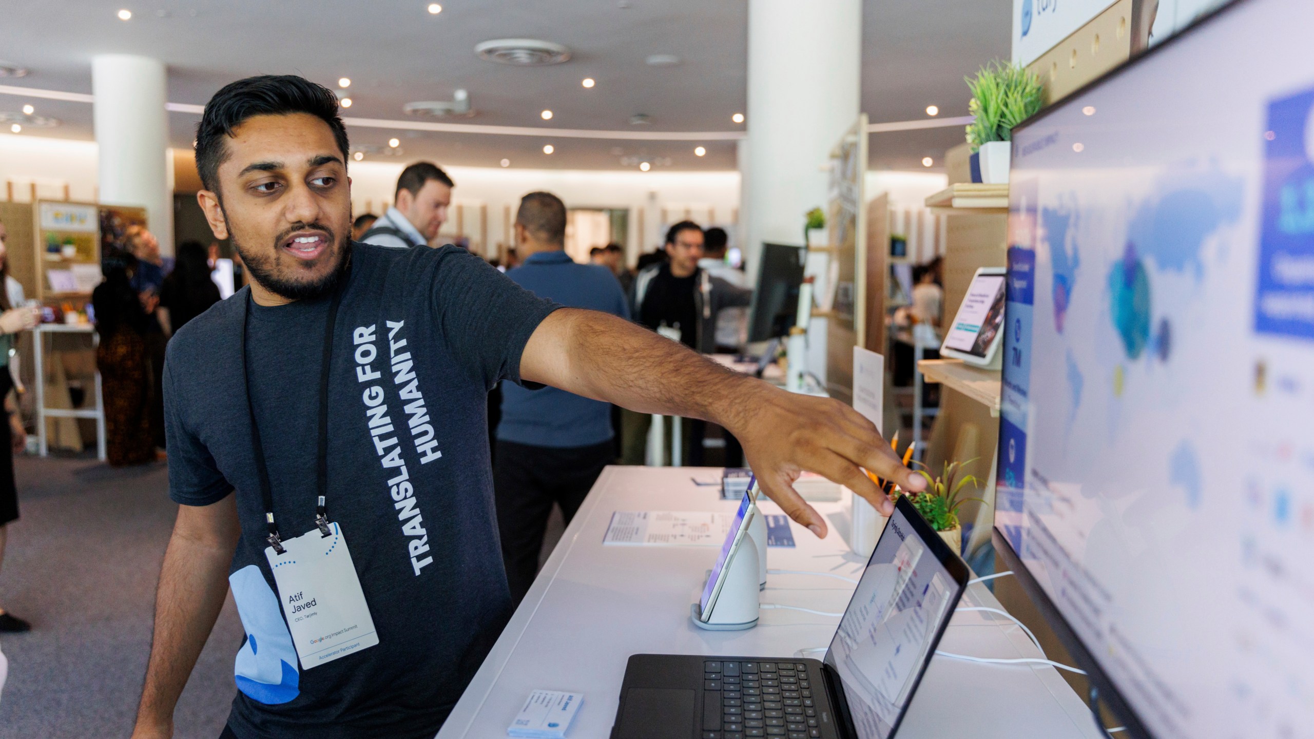 Tarjimly co-founder Atif Javed presents his app at the Google Impact Summit on Wednesday, Sept. 4, 2024, in Sunnyvale, Calif. (AP Photo/Juliana Yamada)