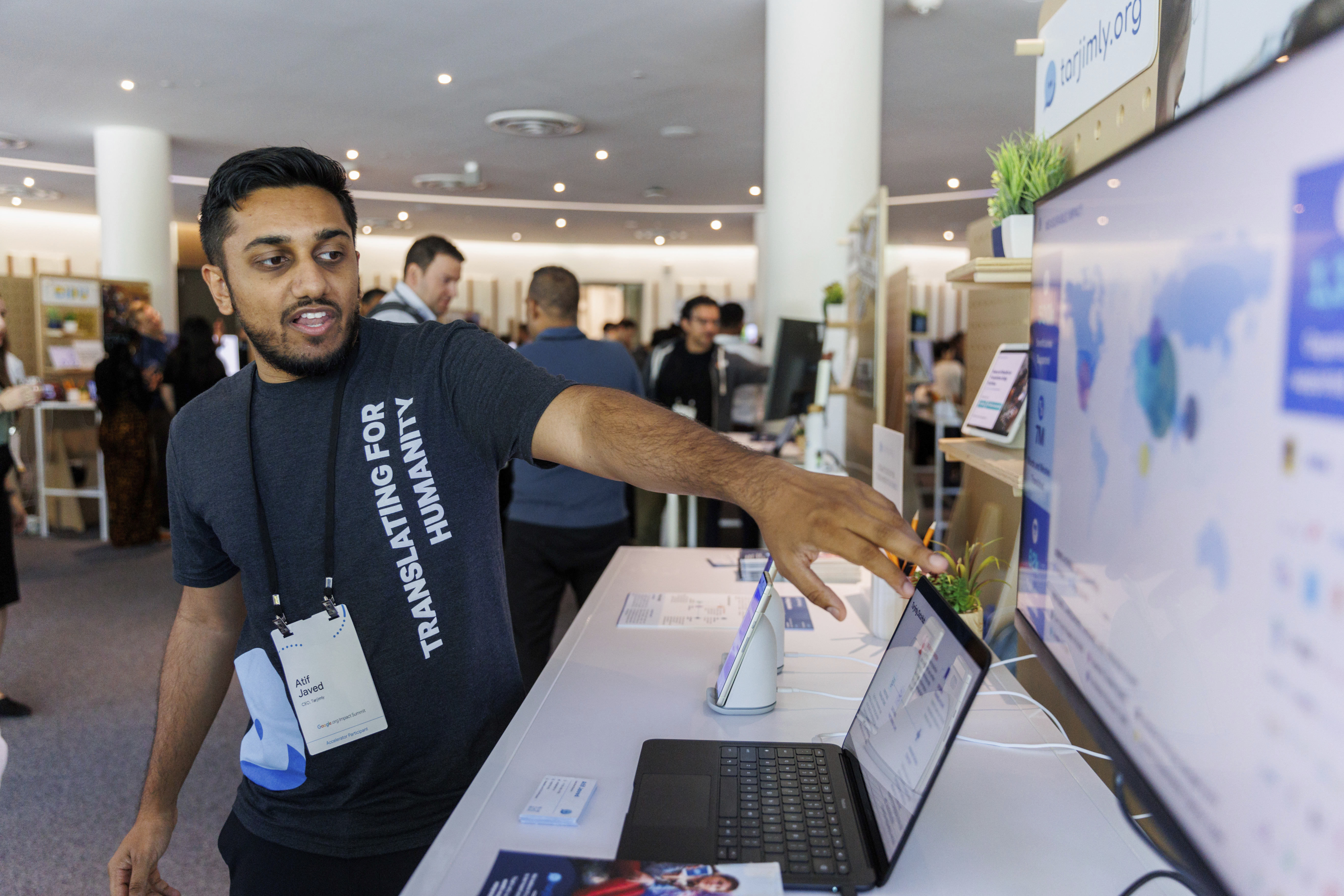 Tarjimly co-founder Atif Javed presents his app at the Google Impact Summit on Wednesday, Sept. 4, 2024, in Sunnyvale, Calif. (AP Photo/Juliana Yamada)