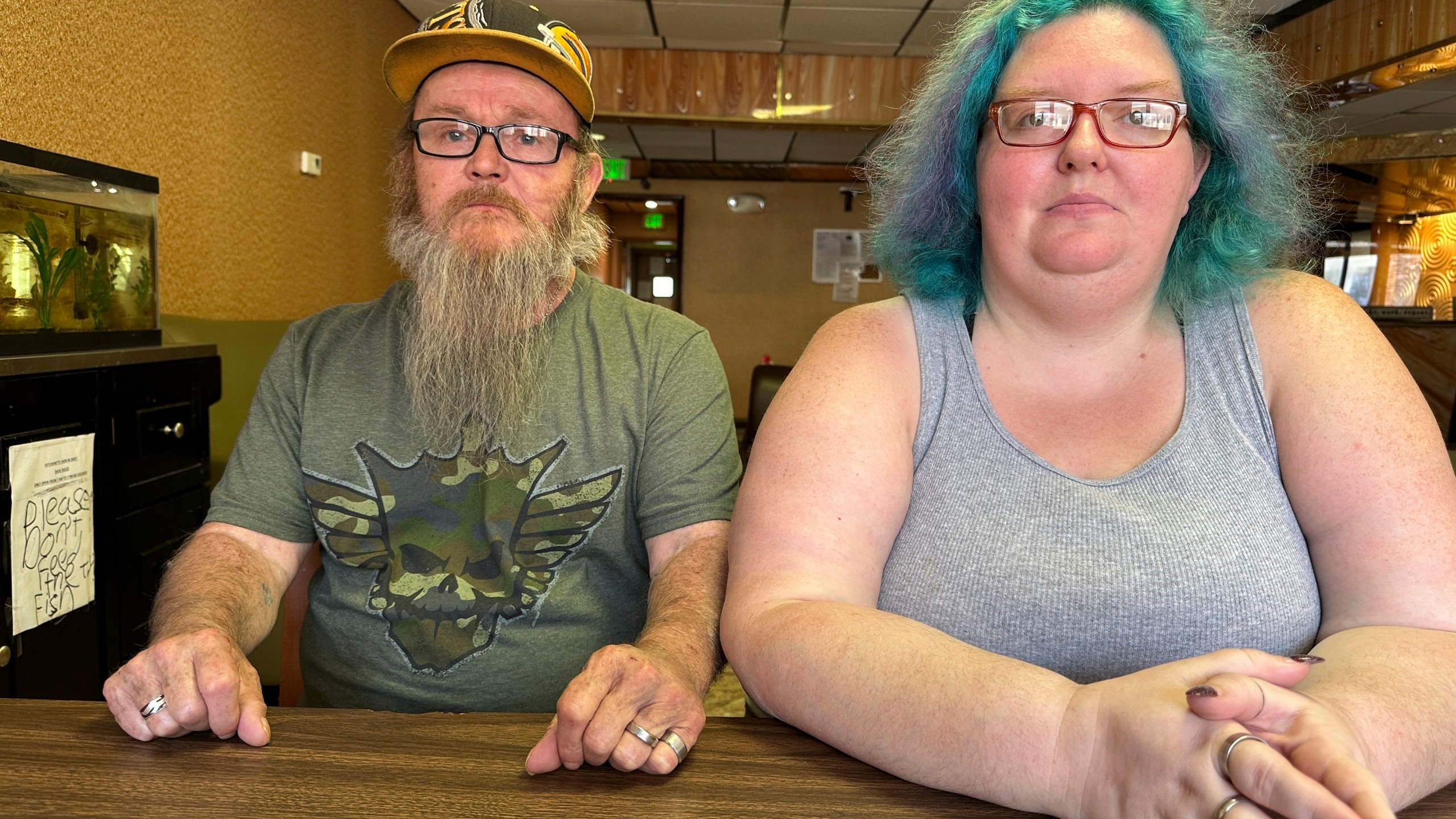 Bruce and Nova Jewett, who are experiencing homelessness, sit at the Hilltop Inn in Berlin, Vt., on Wednesday, Sept. 18, 2024, where they have been living and will have to leave by Oct. 1, 2024. (AP Photo/Lisa Rathke)