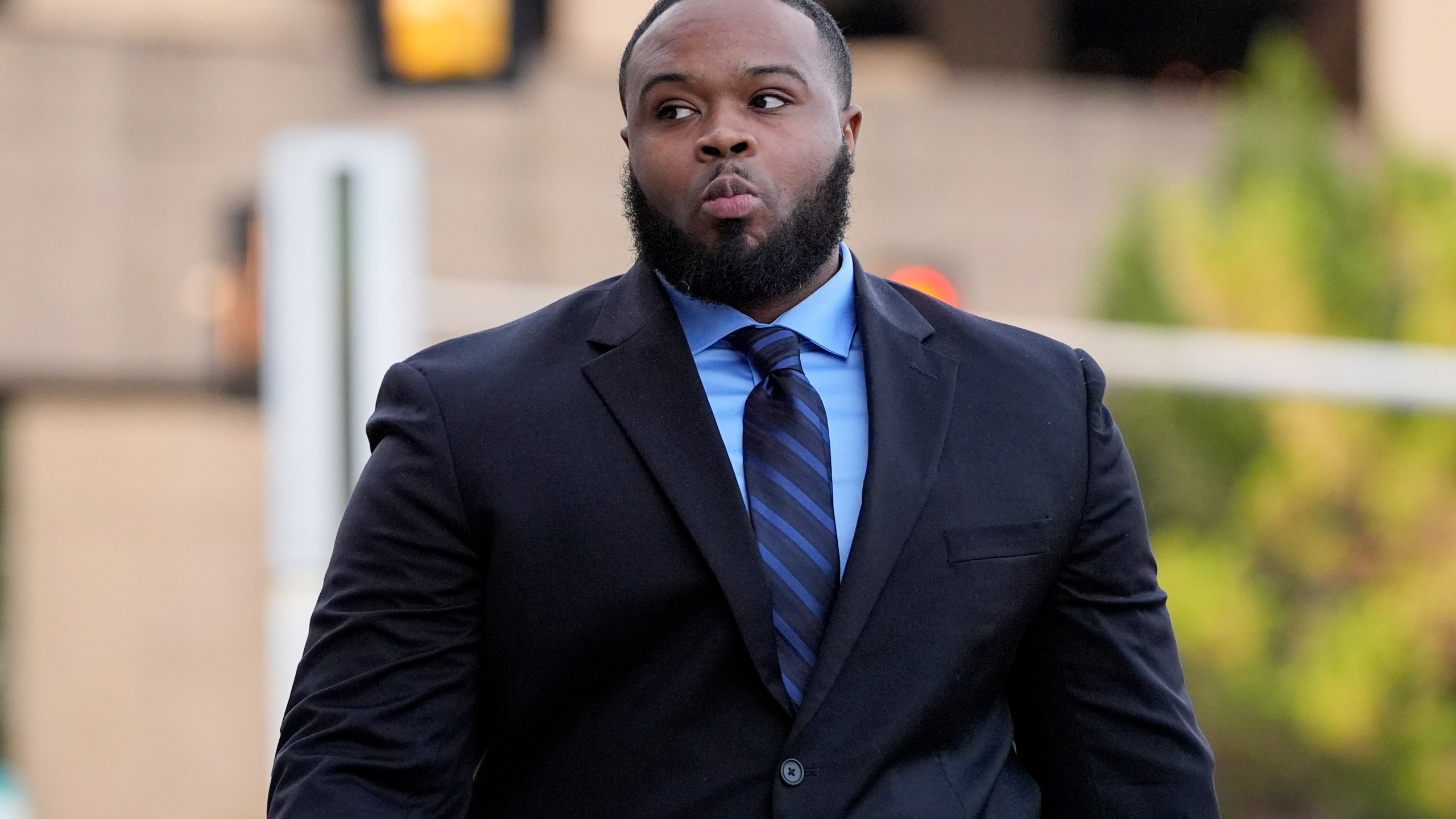 Former Memphis police officer Demetrius Haley arrives at the federal courthouse for the second day of jury selection for the trial in the Tyre Nichols case Tuesday, Sept. 10, 2024, in Memphis, Tenn. (AP Photo/George Walker IV)