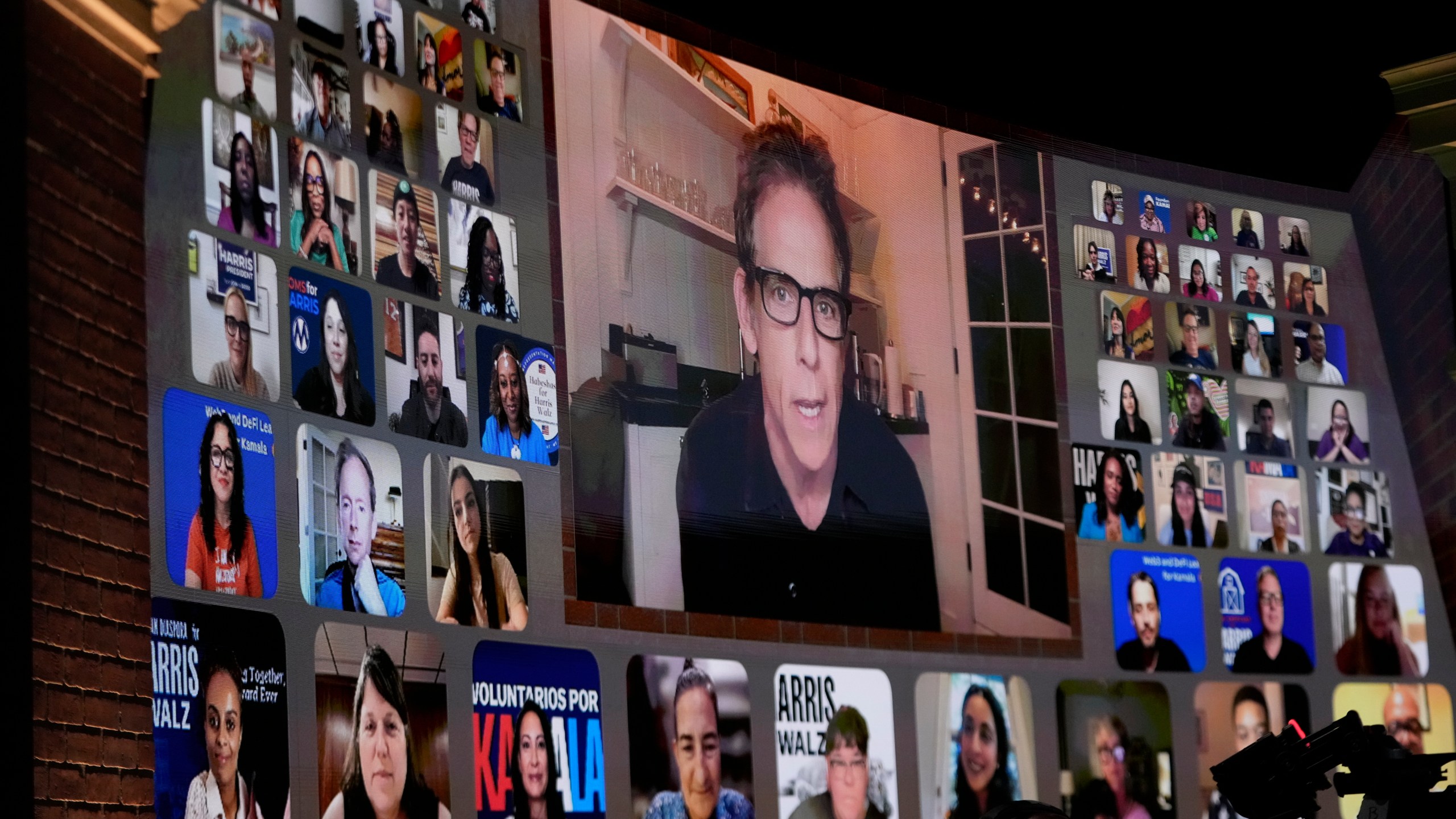 Actor Ben Stiller watches via video Oprah Winfrey speak before Democratic presidential nominee Vice President Kamala Harris joins her at Oprah's Unite for America Live Streaming event Thursday, Sept. 19, 2024 in Farmington Hills, Mich. (AP Photo/Paul Sancya)